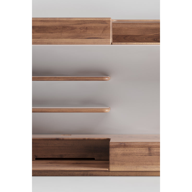The LATUS Modular System by Artisan offers minimalist wooden shelving with two floating shelves and a base with a drawer and open compartment. Crafted from eco-friendly solid wood, its warm, natural finish complements any neutral wall.