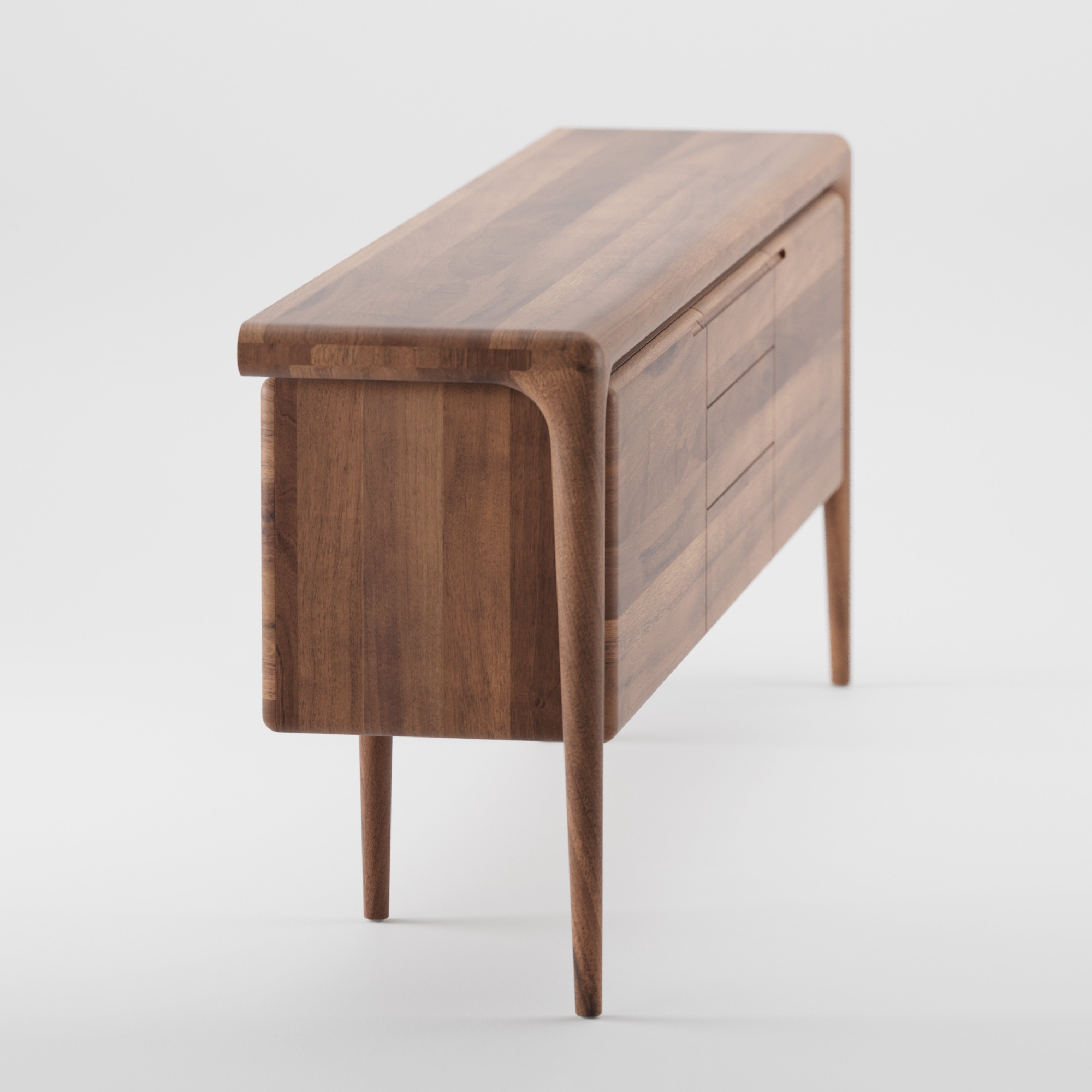 The LATUS Sideboard by Artisan is a modern, sleek piece crafted from solid wood with natural oil finishes. It features rounded edges, tapered legs, two drawers, and a cabinet door for stylish and eco-friendly storage.