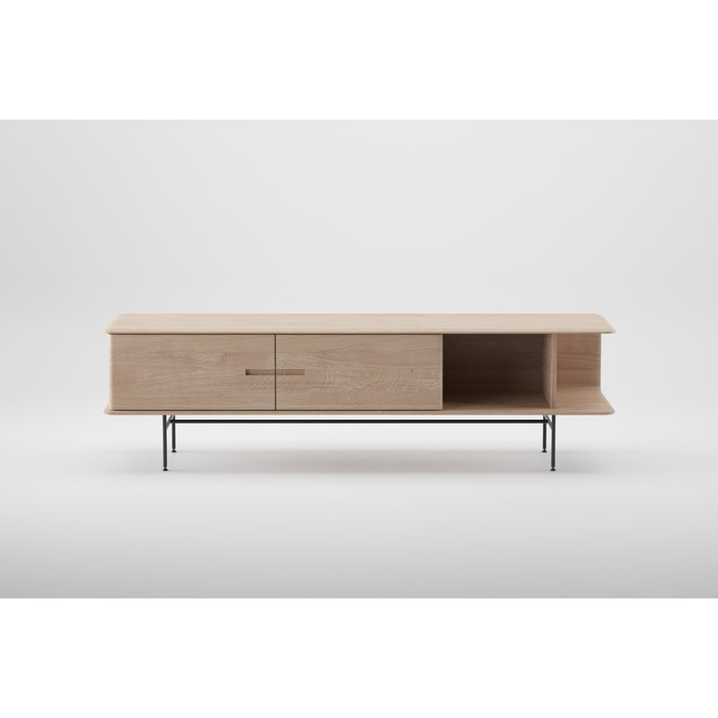 The Artisan Leno Sideboard features a minimalist design with solid wood, a light finish, two doors, an open shelf, and sleek black metal legs against a plain white background.