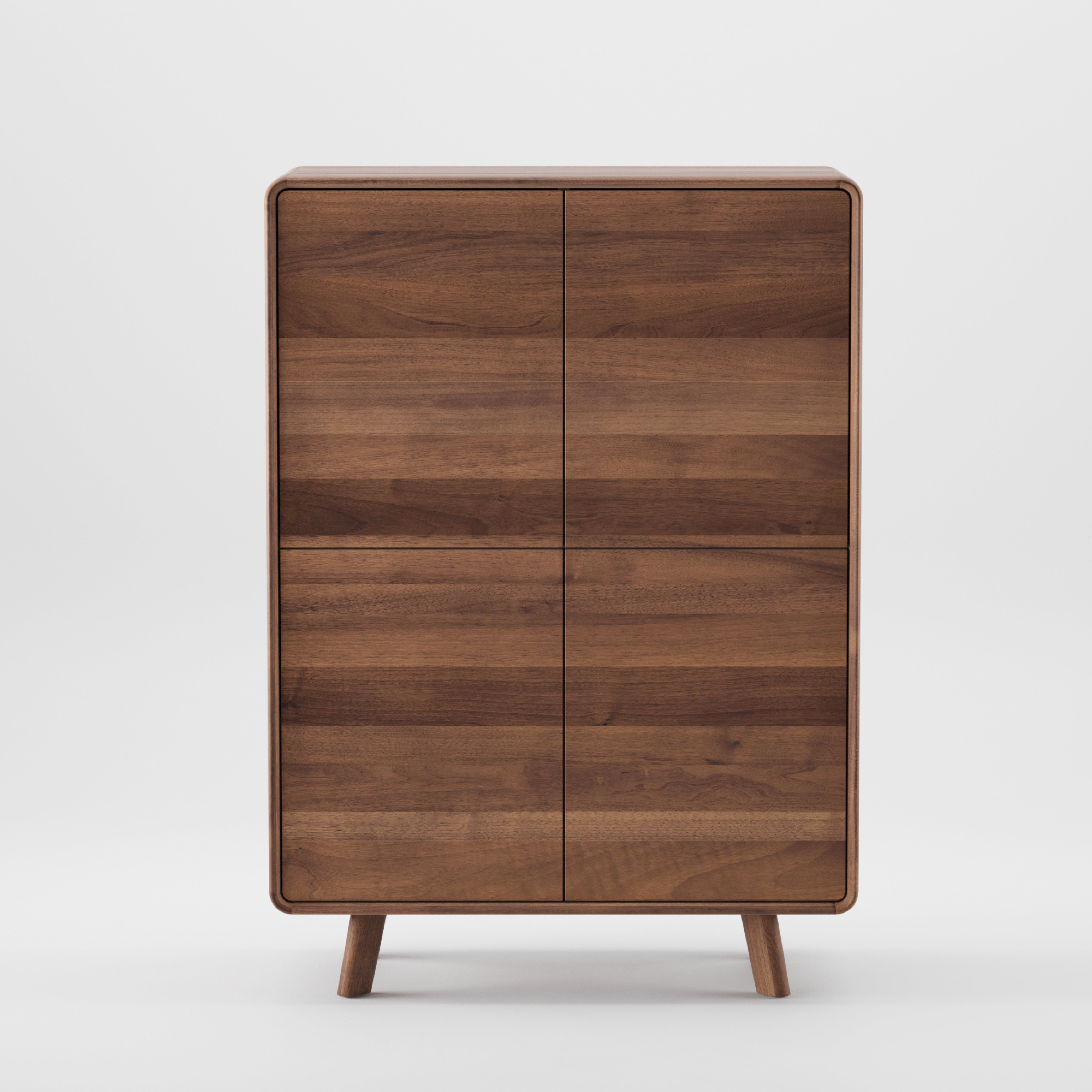 The NEVA Highboard by Artisan is a handcrafted wooden cabinet featuring four drawers, short legs, and a natural wood finish. Its smooth, minimalist design elegantly blends modern and classic styles.
