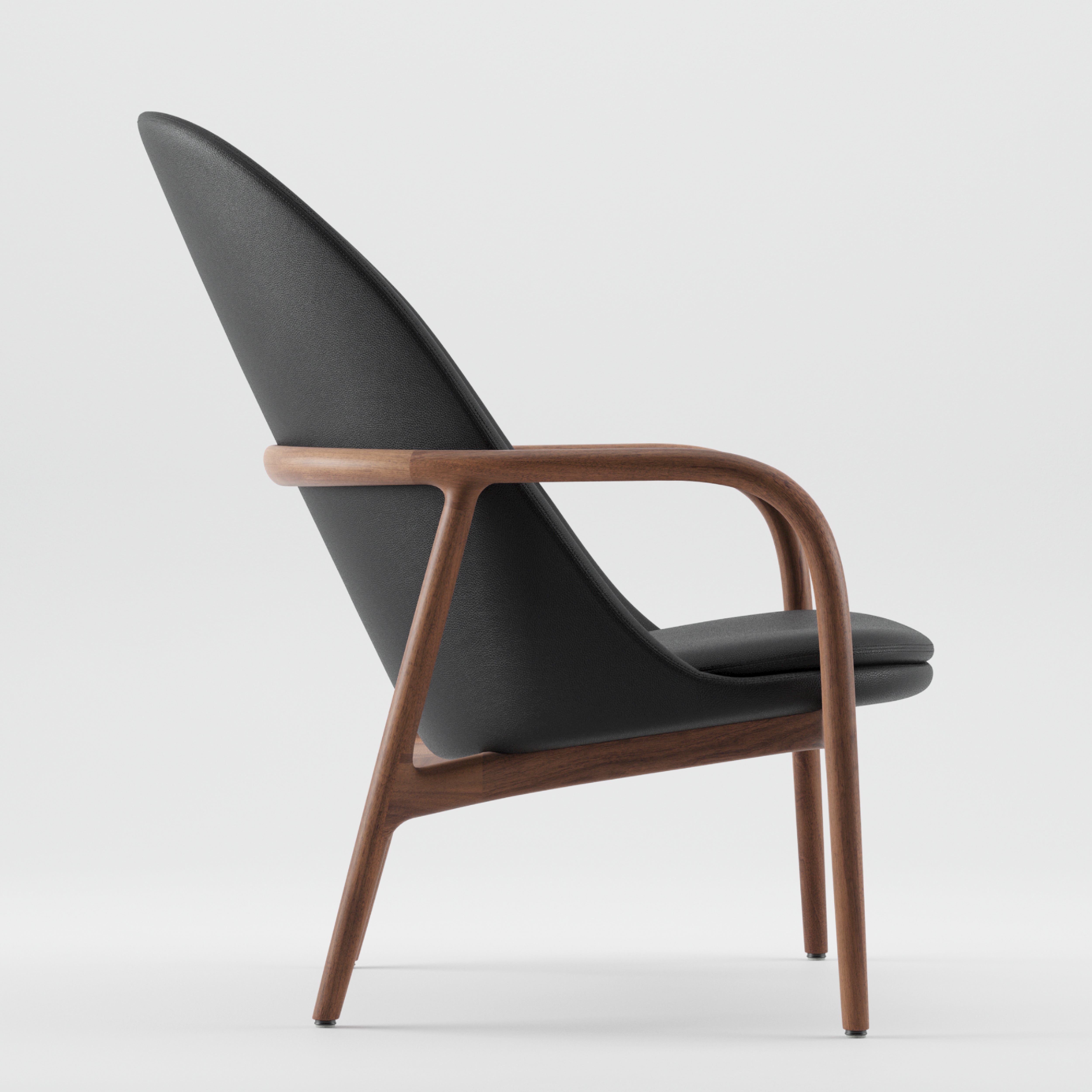 The NEVA Lounge Chair High by Artisan combines modern technology with artisanal craftsmanship, featuring a sleek black seat and backrest. Its curved wooden frame and armrests showcase minimalist elegance, echoing Scandinavian lounge chair design.