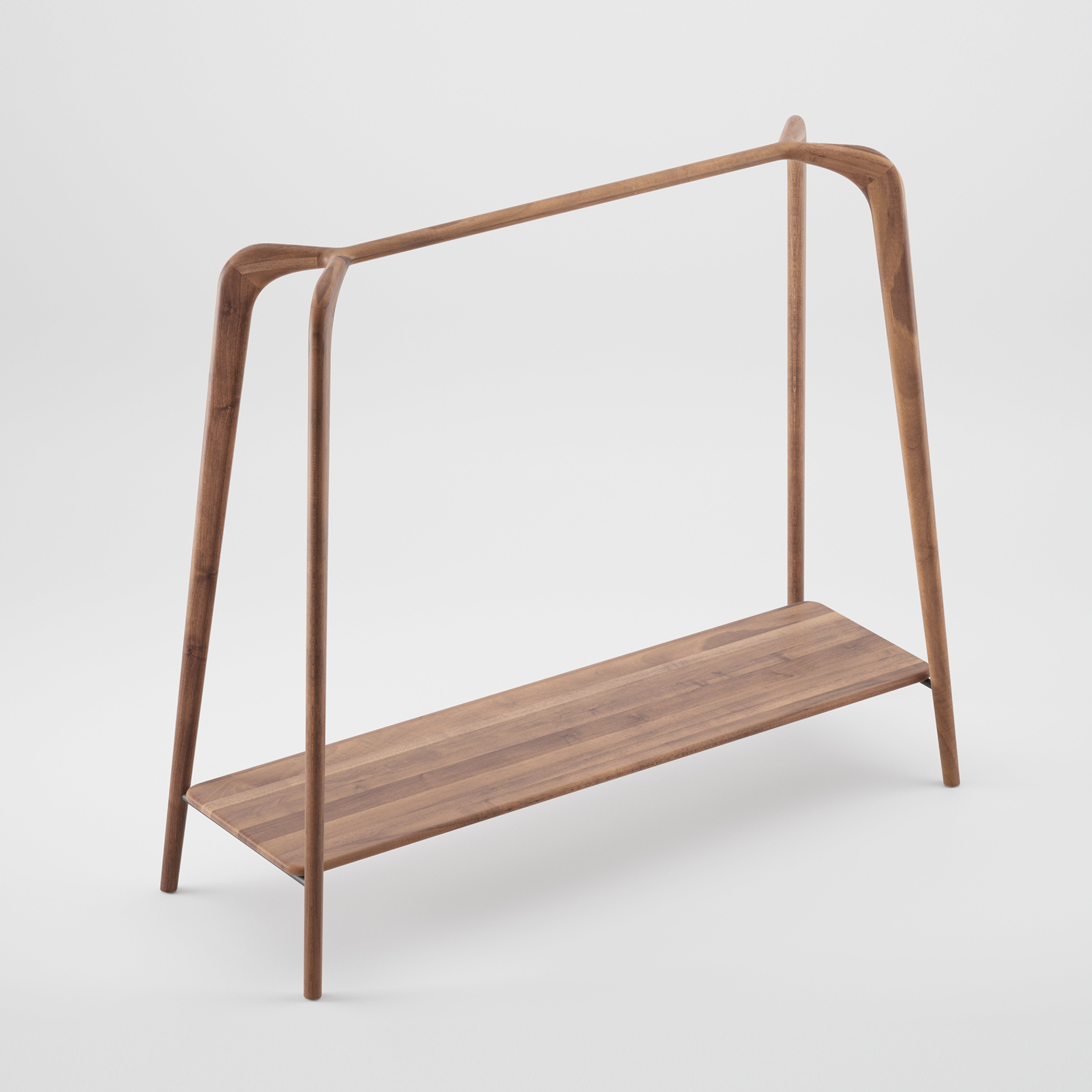 The Artisan SWING Coat Stand is a minimalist wooden rack made from solid wood. It features a simple frame, a bottom shelf, smooth curved edges, and a luxurious wood texture, set against a white background for an elegant look.