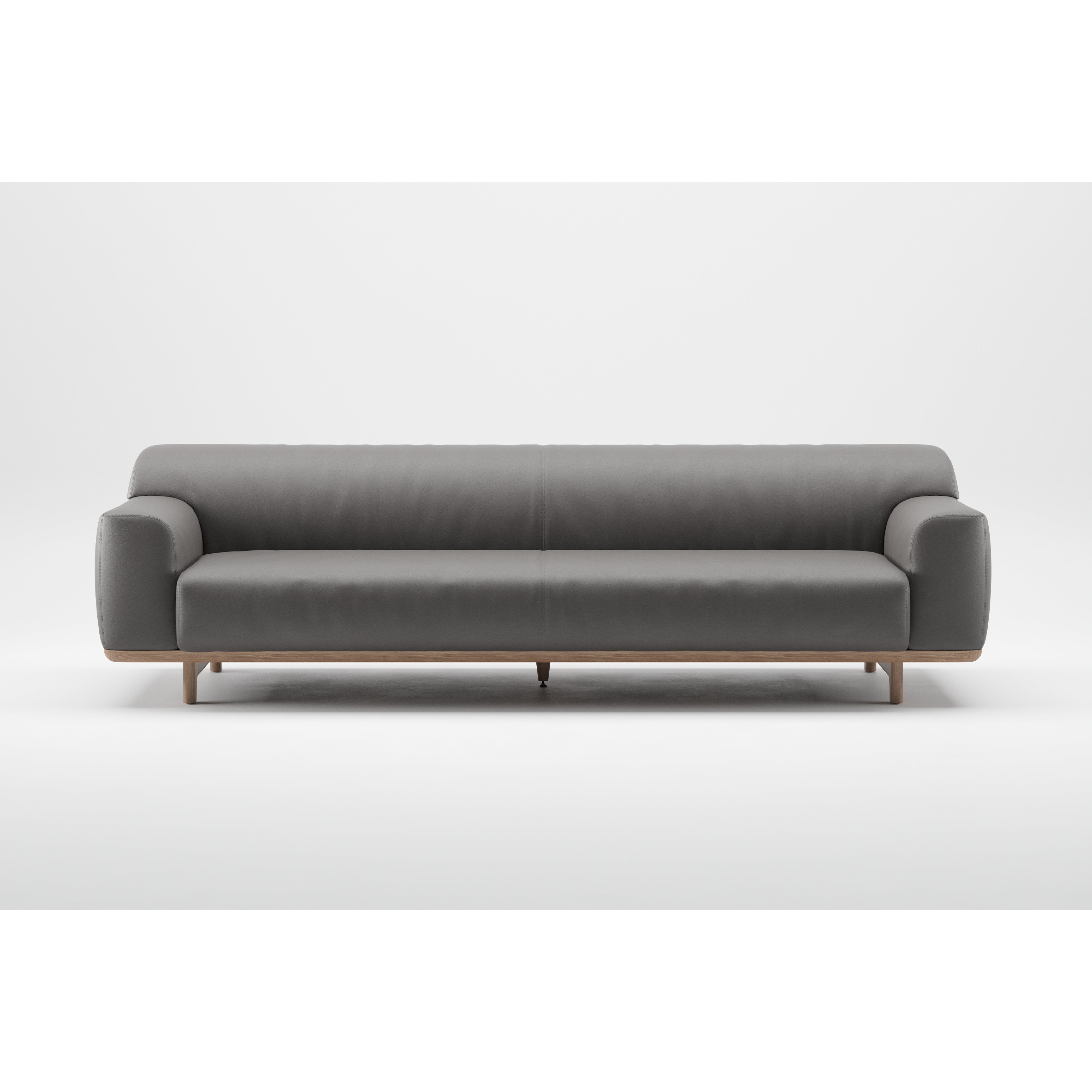 The Tara Sofa by Artisan is a modern, gray sofa featuring a minimalist design with curved armrests and a solid wood base and legs. Crafted from eco-friendly materials, it is displayed against a plain white background.