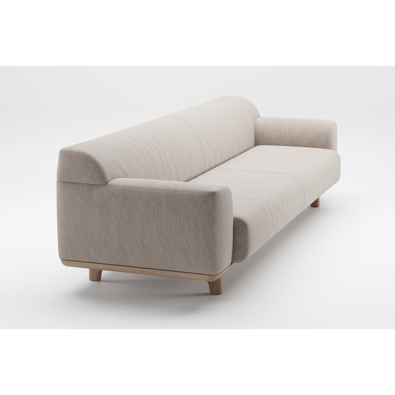 The Tara Sofa by Artisan is a modern, light beige piece with a minimalist design and clean lines, featuring an eco-friendly solid wood base. It offers thick cushioned seats and armrests, all set against a white background to emphasize its simple elegance.