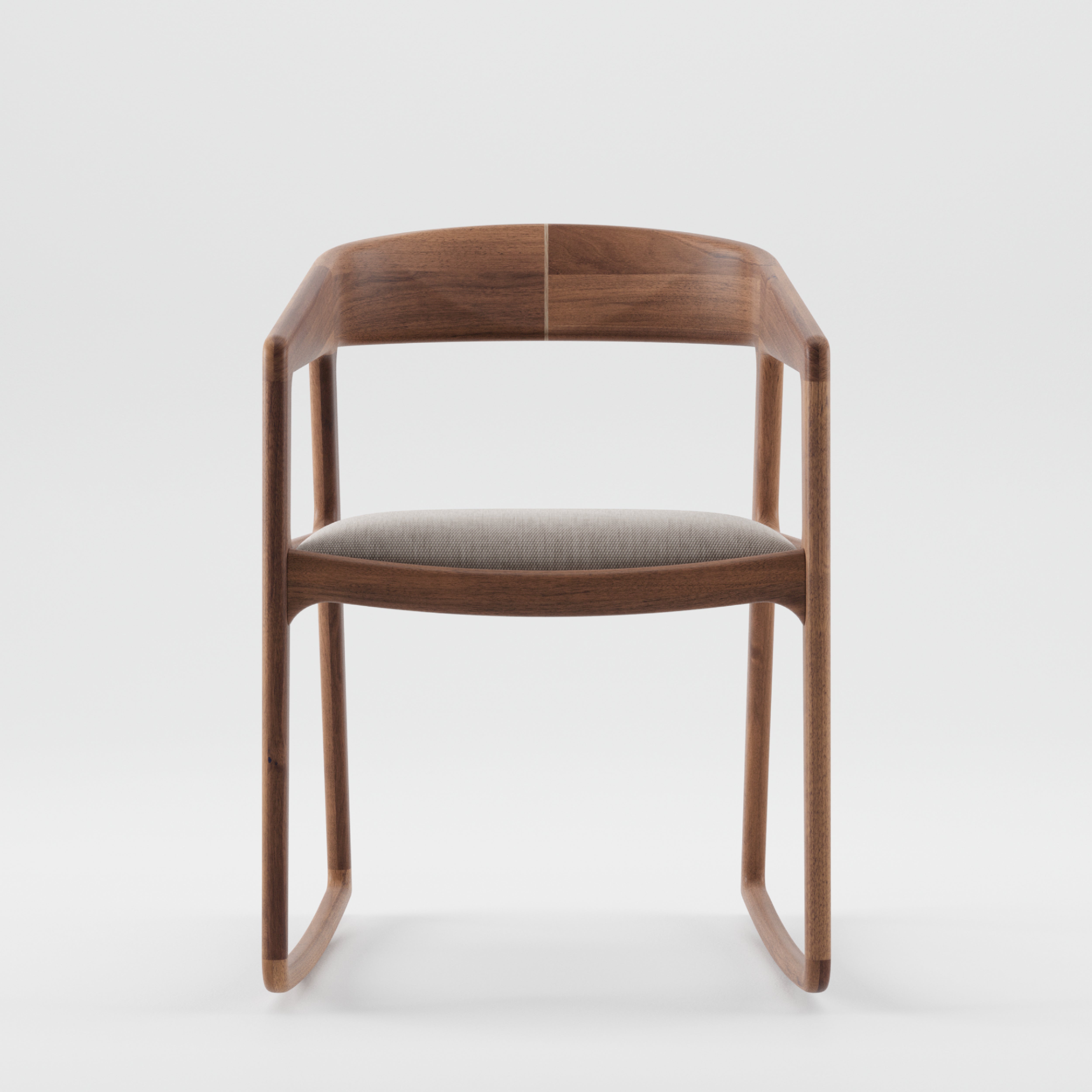 The TESA SWING CHAIR by Artisan is a minimalist piece featuring solid wood construction, a curved backrest, and a light gray cushioned seat. Finished with natural oils, its smooth, rounded edges boast an eco-friendly modern design against a white background.