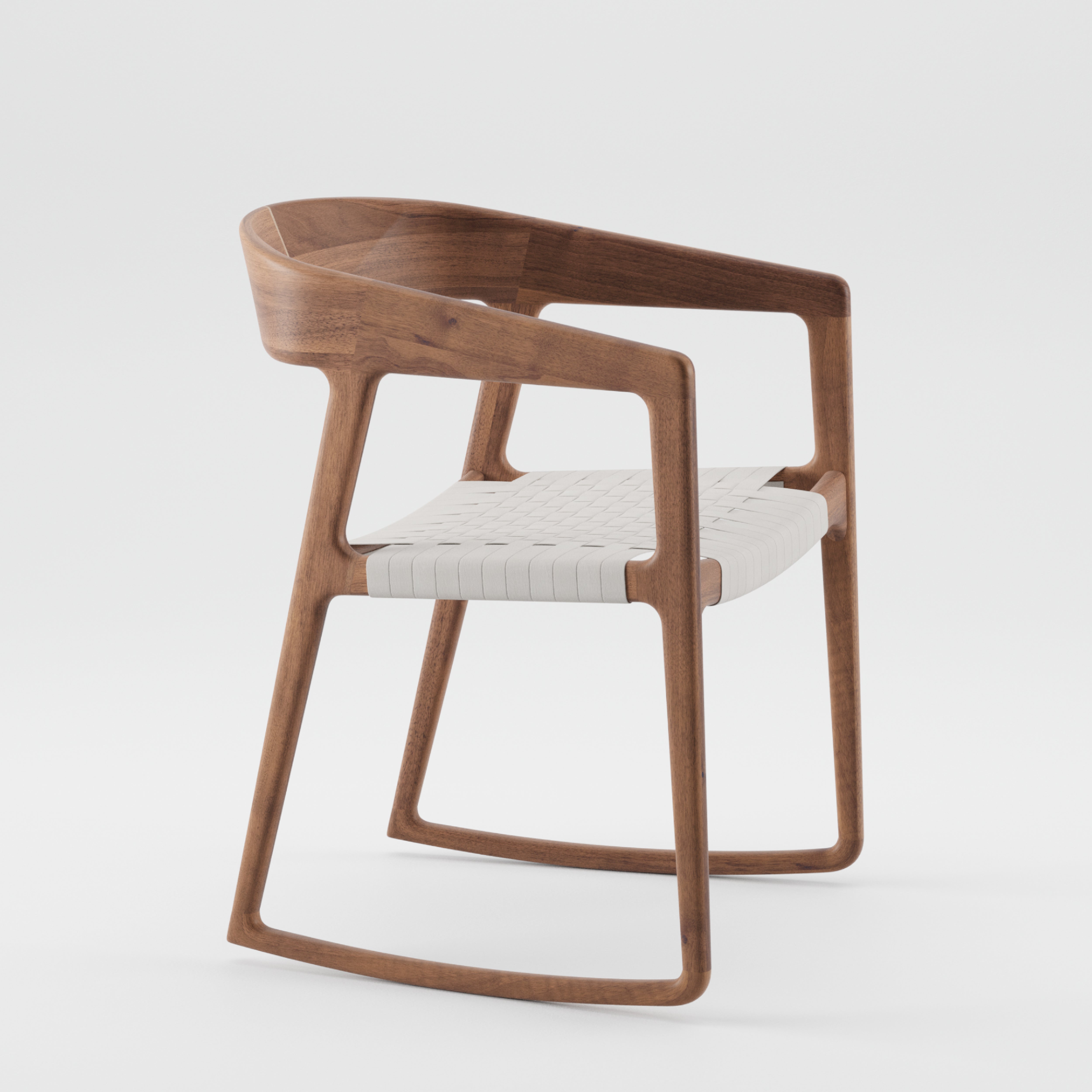 The TESA SWING CHAIR by Artisan is a modern wooden armchair with a curved backrest and open sides. Crafted from solid wood, it features a white woven seat, finished with natural oils. Its minimalist design and smooth edges are showcased against a plain white background.