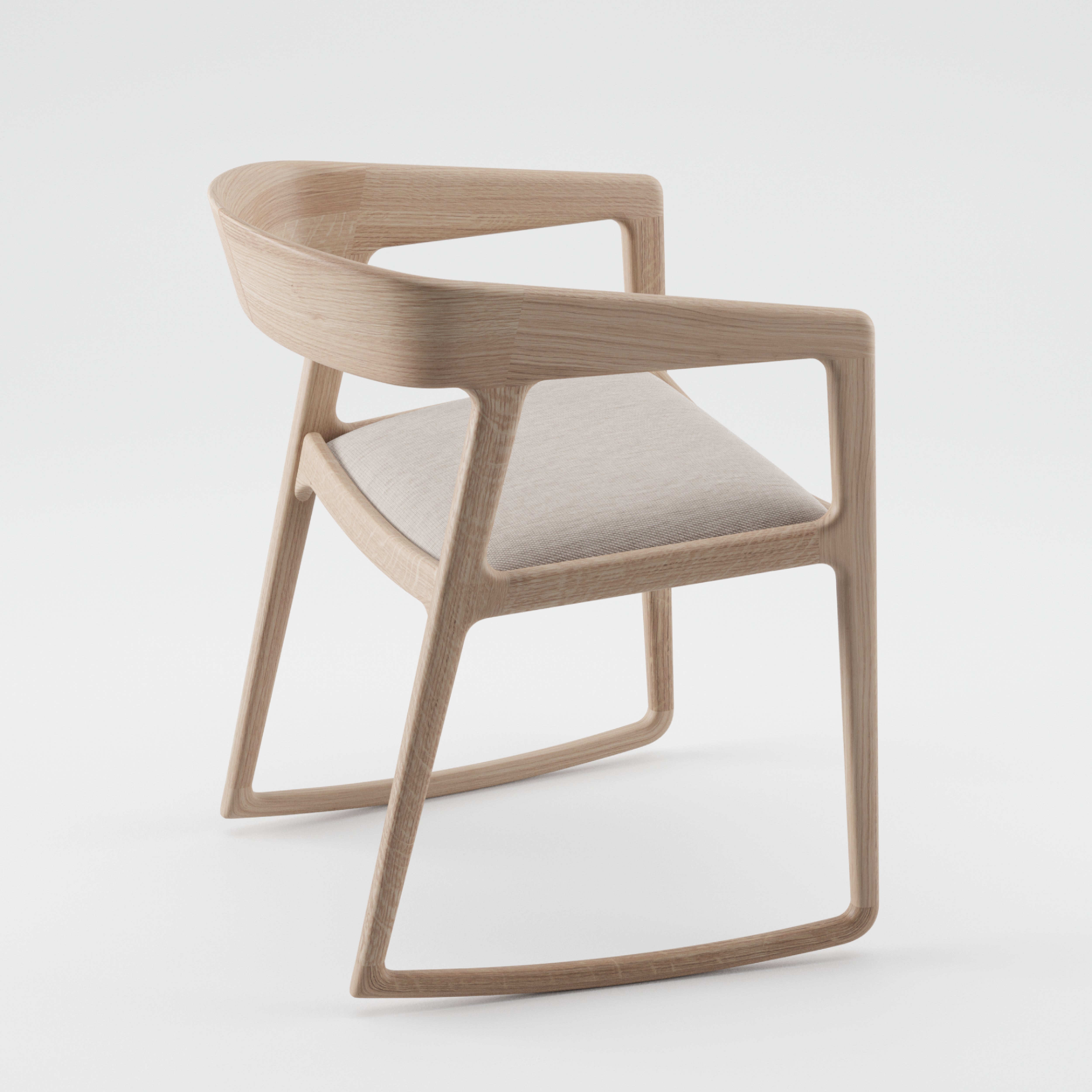 The Artisan TESA SWING CHAIR boasts an environmentally-friendly light wood frame and a light gray cushioned seat. Its solid wood design features an open back and angular structure, set against a plain white background.