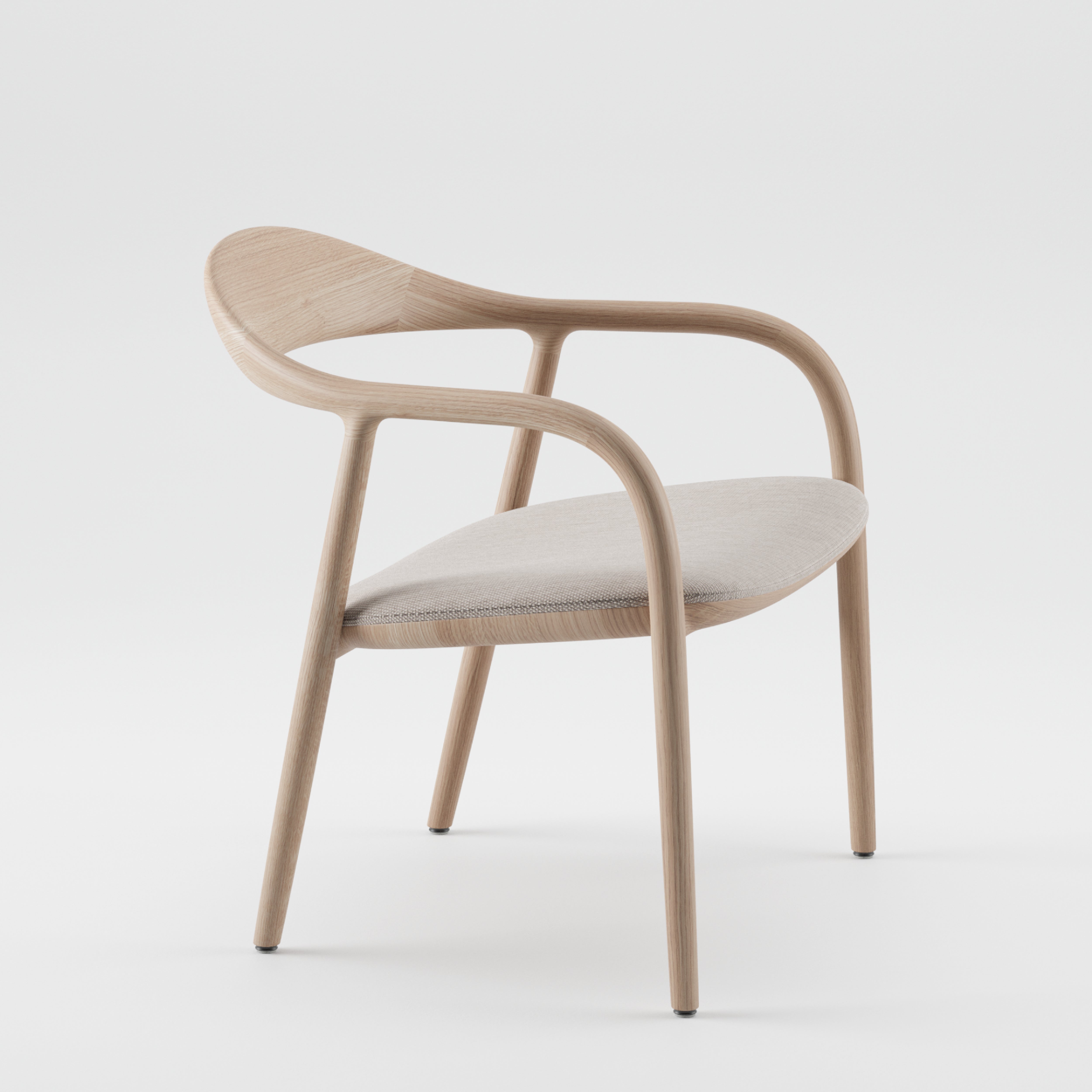 The Artisan NEVA Easy Chair features a minimalist design with a 5-axis CNC-crafted light wood frame, ergonomic curved backrest, light gray cushioned seat, and four slender legs, offering a simple yet elegant look against a white background.