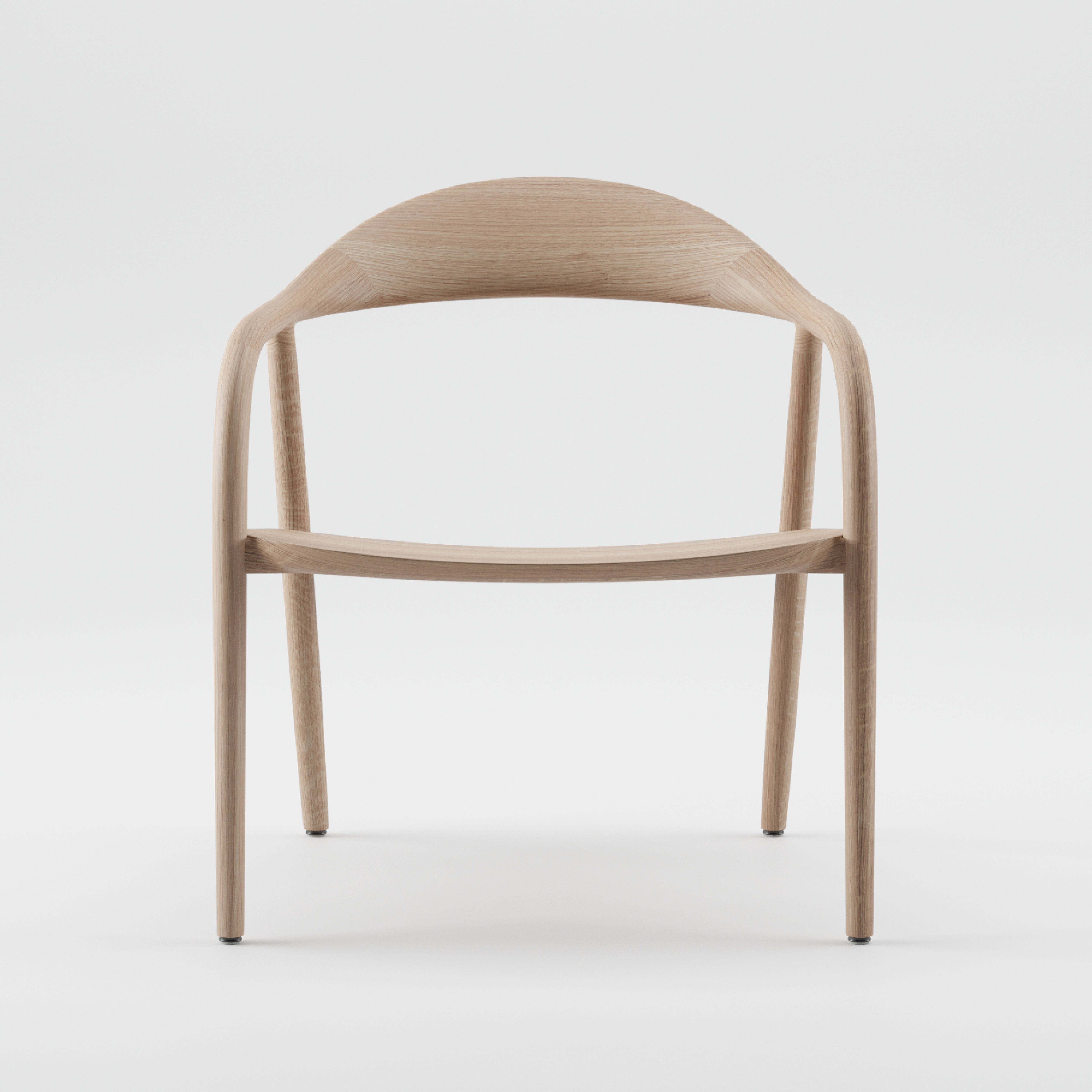 The NEVA Easy Chair by Artisan is a minimalist wooden piece with flowing curves and a light natural finish. Its ergonomic design features a rounded backrest transitioning into armrests on slender legs, crafted using precision 5-axis CNC technology for an elegant, airy appearance.
