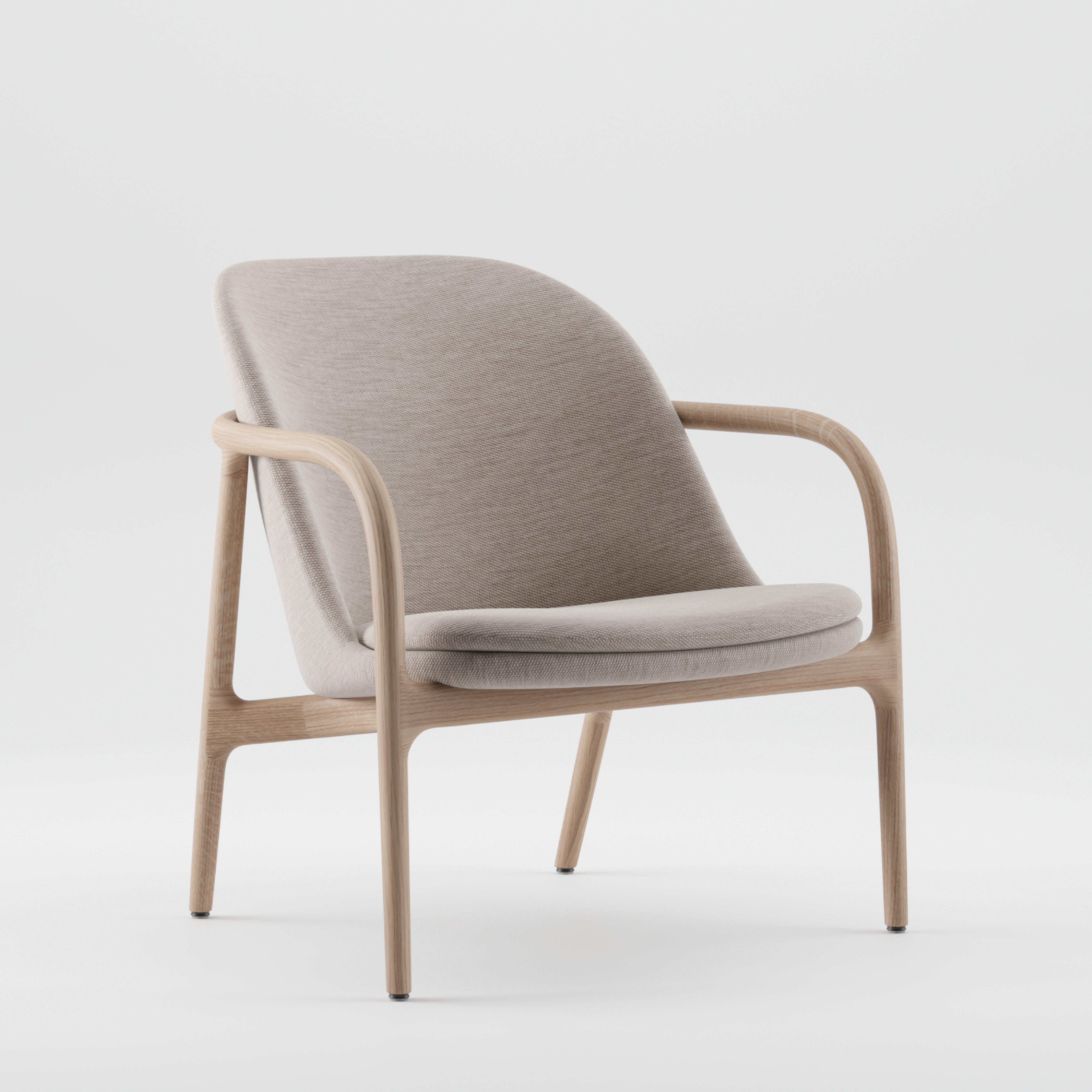 The NEVA Lounge Chair Trimmed from Artisan boasts a sleek Scandinavian design with a light wooden frame and soft, curved gray fabric cushion, characterized by its minimalist style and gentle curves set against a white background.
