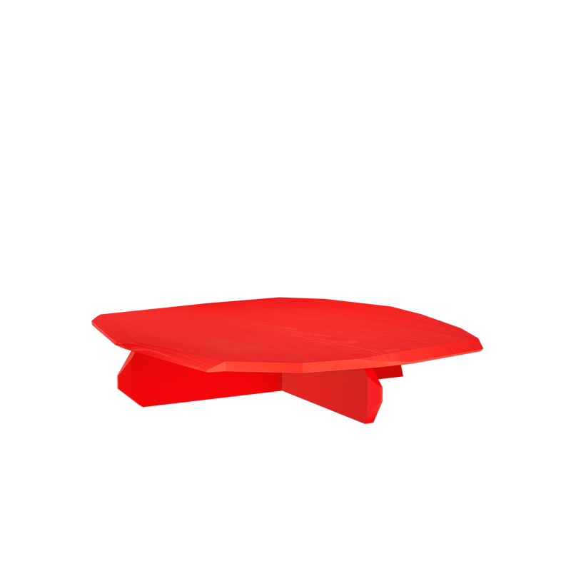 The Fels Coffee Table by Objekte unserer Tage is a masterpiece with its modern geometric red surface and unique base, offering sculptural beauty that pops against a black background.