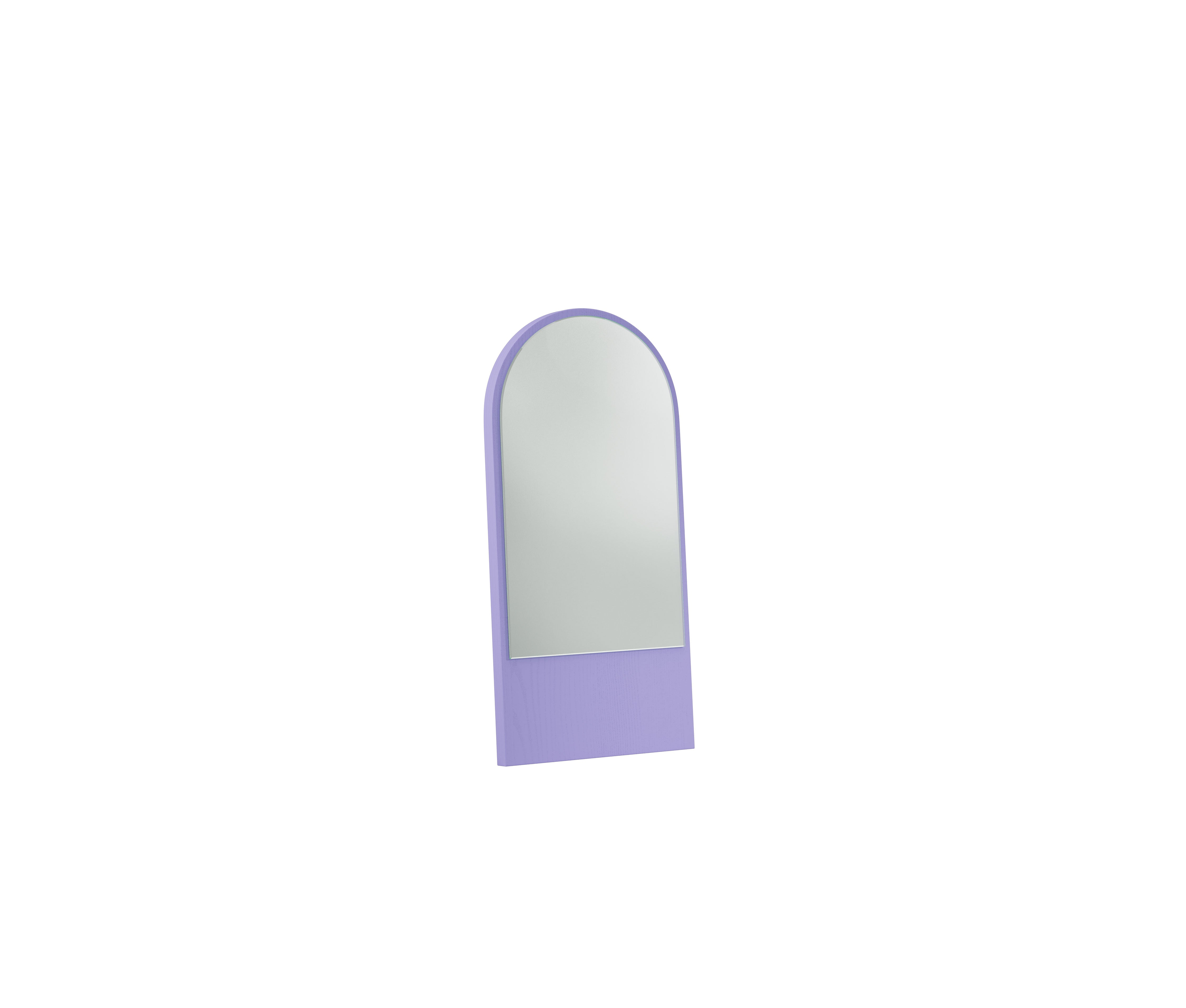 The Friedrich Mini Mirror by Objekte unserer Tage features a standing, arched design with an expressive pastel purple frame atop a rectangular base that provides stable support reminiscent of floral wood grain, all set against a white background.