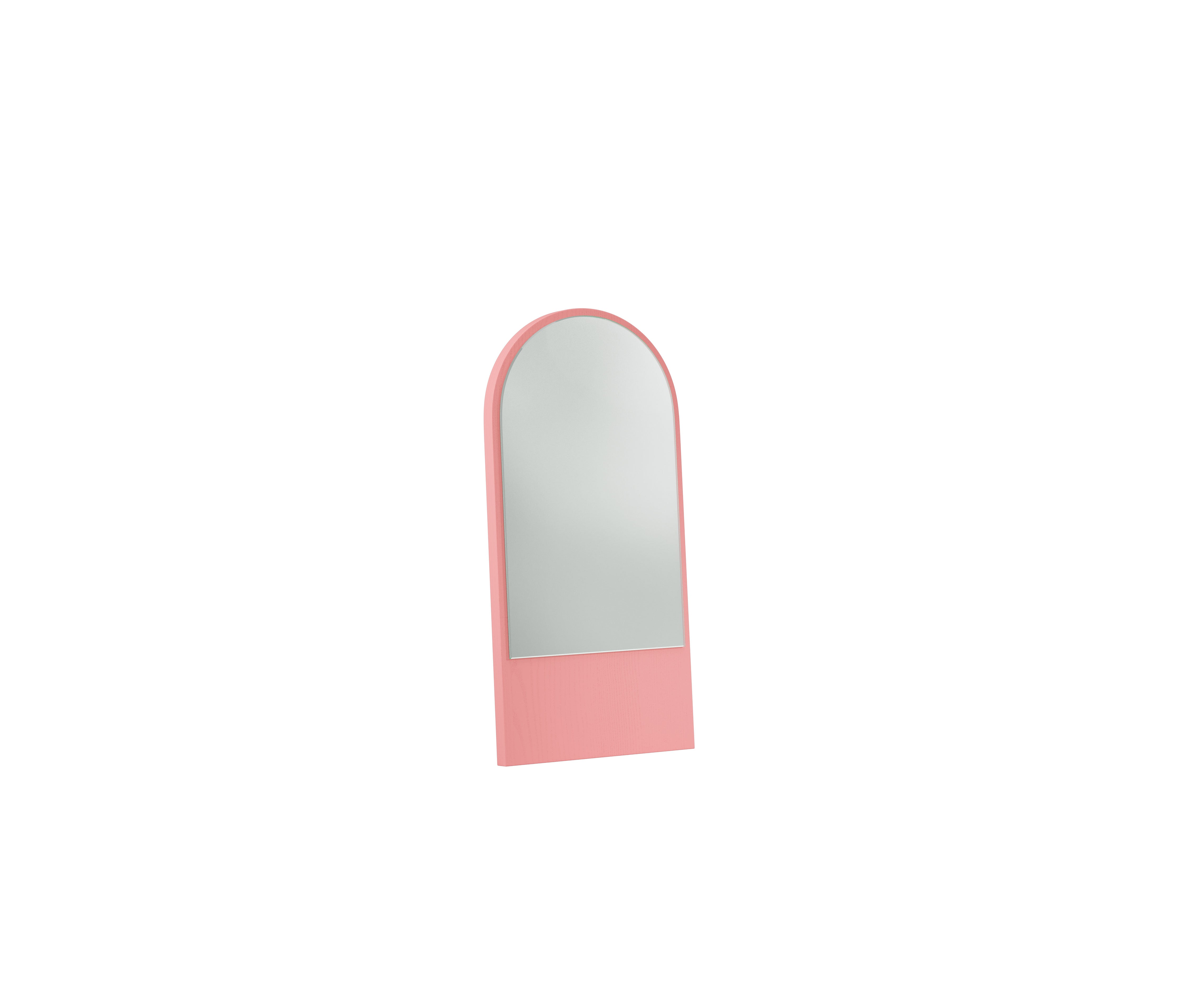 The Friedrich Mini Mirror by Objekte unserer Tage is a pink, arched tabletop mirror with reflective glass and a solid pink base. It angles slightly right on a white background, highlighting its expressive colors.
