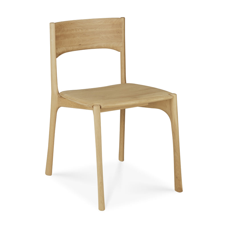 Pi Dining Chair made of oak wood with sleek natural curves and polished imperfect finish for durable seating.