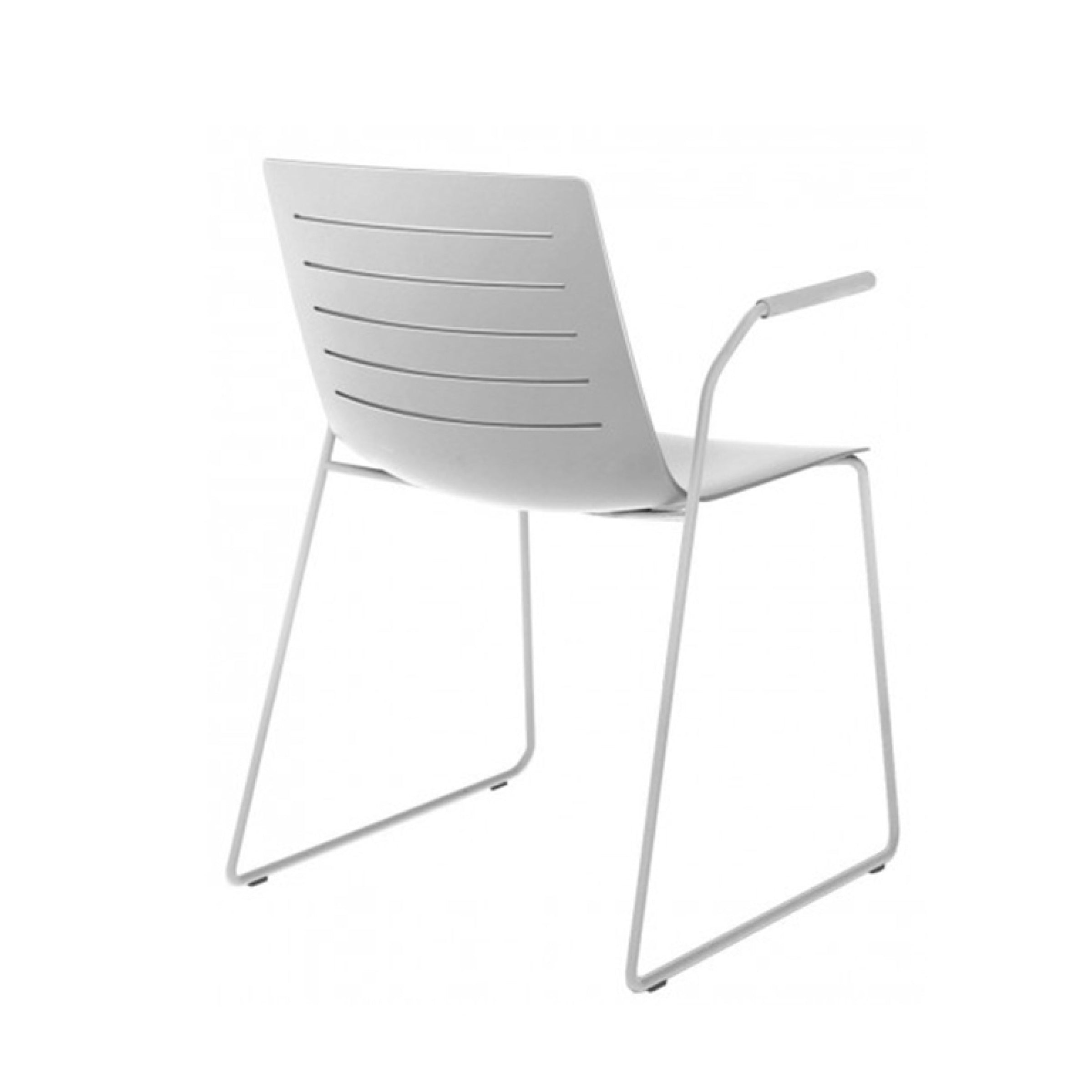 The Skin Sled Armchair by Resol boasts a minimalist design with a fiberglass polypropylene seat, slatted backrest, and sleek metal armrests. Supported by thin legs, this stackable chair shines against a white backdrop, highlighting its elegant simplicity.