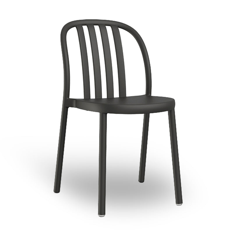 The Sue Chair by Resol is a black metal chair with a rounded back, four vertical slats, and slightly angled legs. Crafted sustainably, its design is smooth and minimalist.