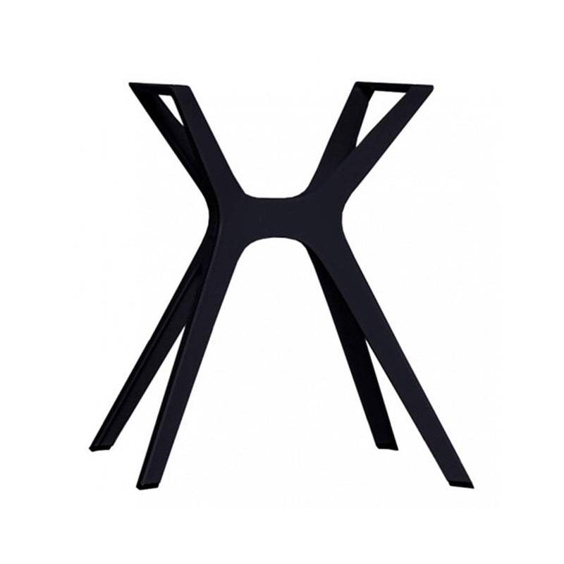 The Vela Table S by Resol boasts a sleek, modern design with a black metal base featuring four angled legs and intersecting bars forming an X shape at the center. Suitable for indoor and outdoor use, it exemplifies innovative furniture solutions against a plain white background.