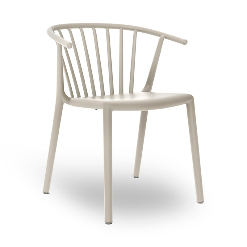 The Resol Woody Chair is a modern beige chair with a round backrest and vertical slats, featuring four sturdy legs. Sustainably crafted, it boasts a minimalistic design and smooth finish, embodying a contemporary style ideal for both indoor and outdoor use.