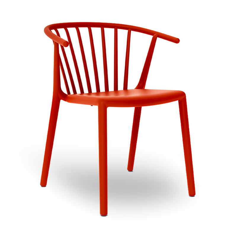 The Woody Chair by Resol is a modern red plastic chair featuring UV protection, a rounded backrest with vertical slats, and tubular legs. Designed for indoor and outdoor use, its sleek minimalist style contrasts elegantly with a plain white background.