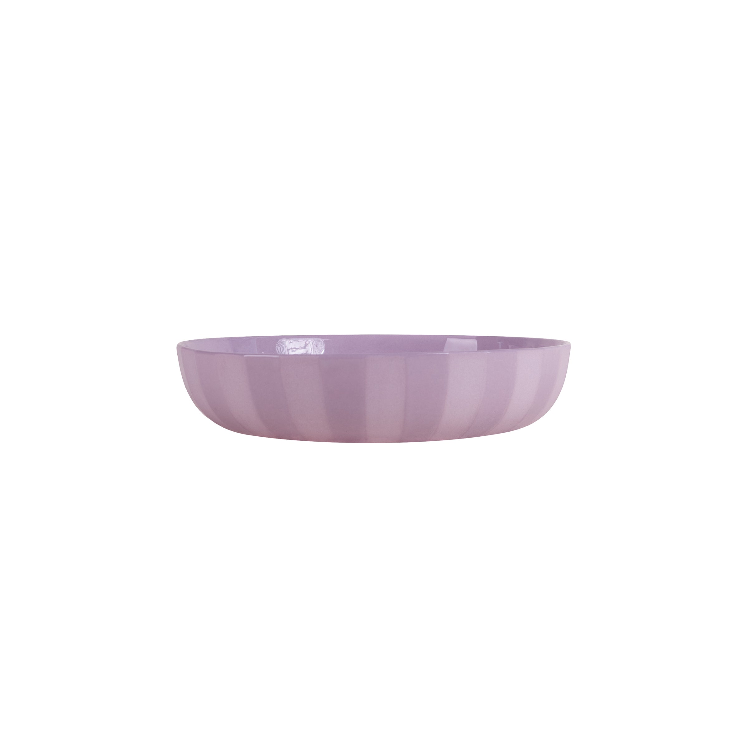 The Facet Tableware - Big Bowl by Schneid is a round ceramic bowl in pastel purple with subtle vertical stripes, designed to explore color dynamics against a plain white background.
