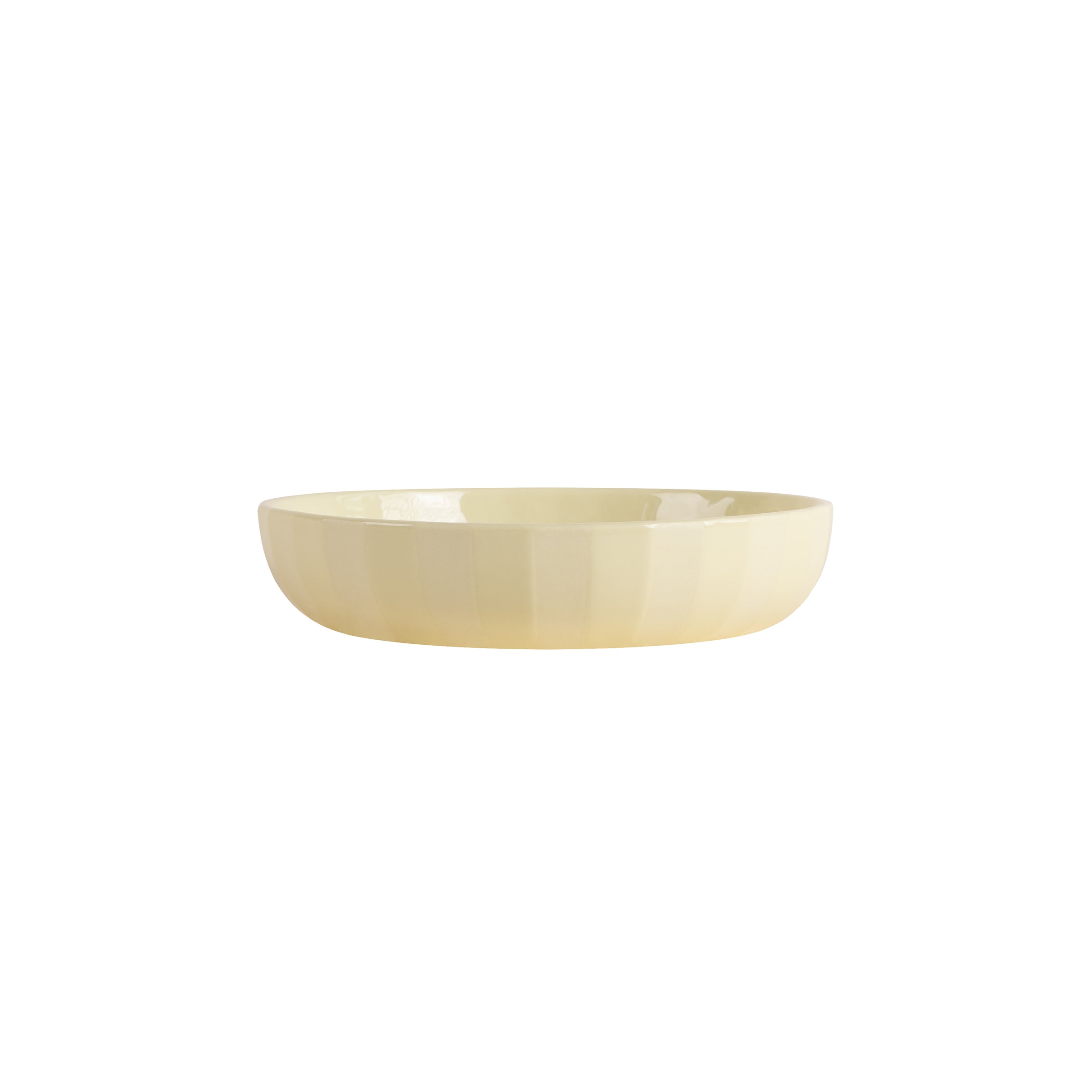 A simple, beige, glossy Facet Tableware - Big Bowl by Schneid sits against a white background. This ceramic piece is round with a shiny finish and slightly flared edges, adding subtle color dynamics to any setting.