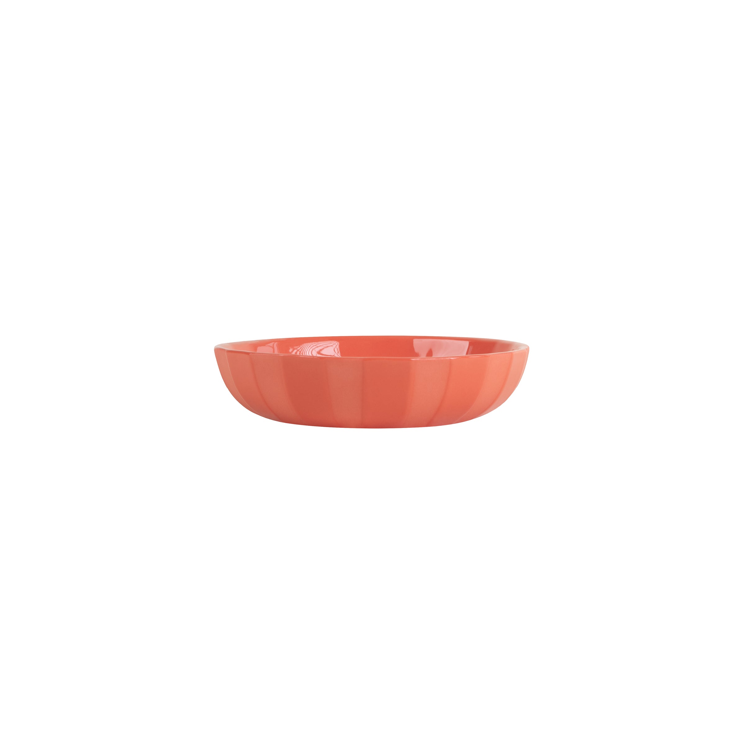 The Schneid Facet Tableware - Small Bowl, a round orange ceramic piece with a glossy finish, elegantly sits on a plain white background. Its smooth, simple design enhances any setting.