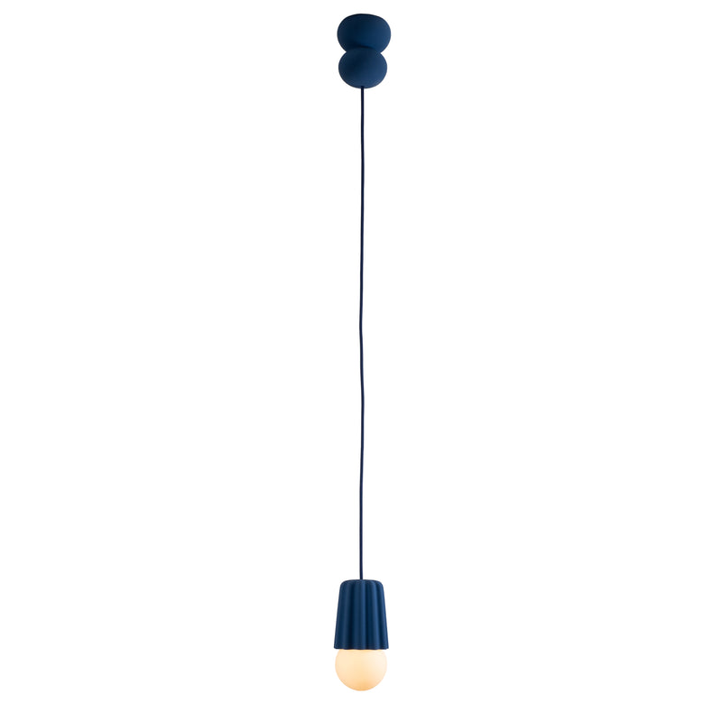 The Stucco No. I pendant light by Schneid features a minimalist design with a round bulb hanging from a sleek, thin black cord linked to two black ceiling spheres. The bulb is housed in a simple black holder, offering creative luminosity and a sleek, modern aesthetic.