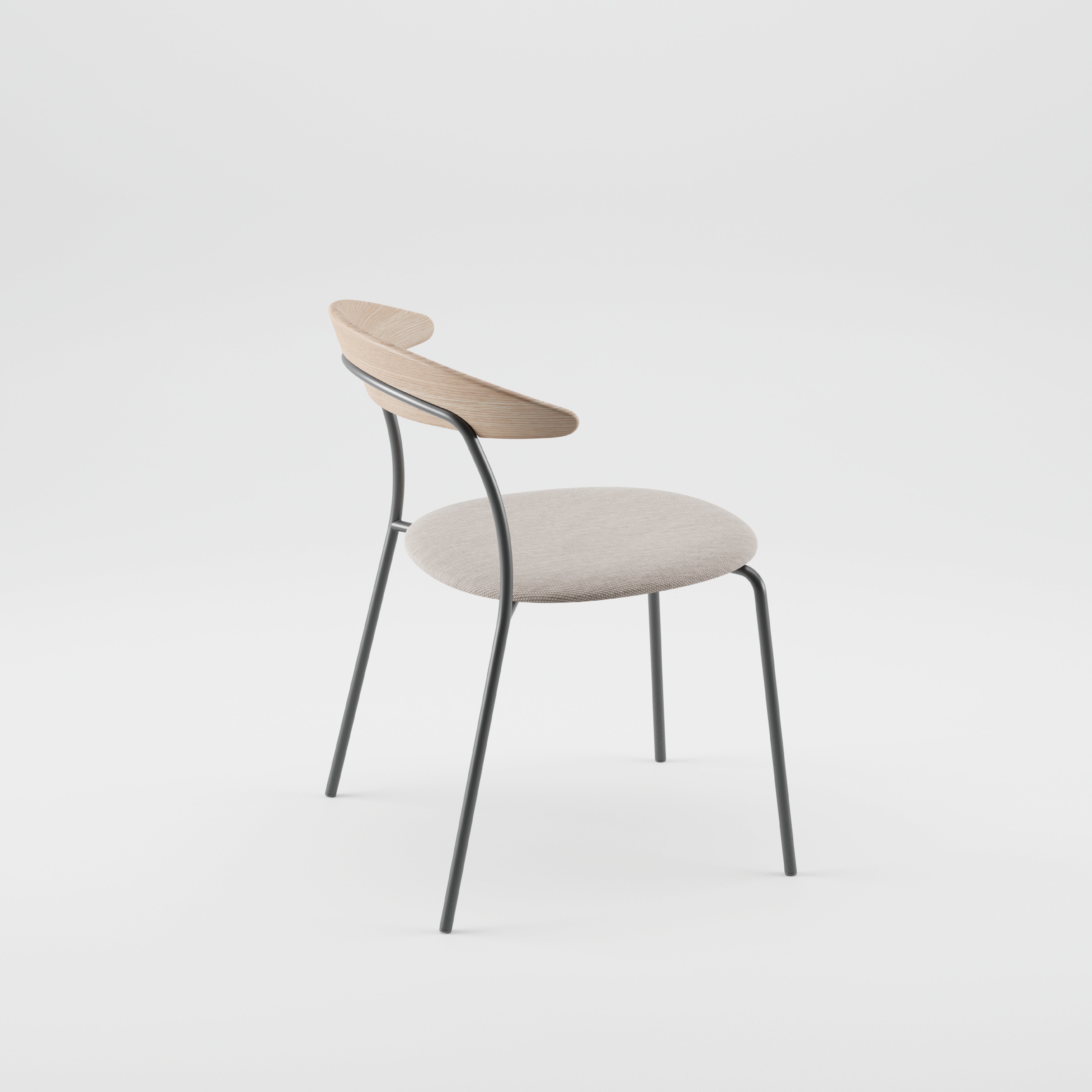 The KINU Chair by Artisan is a contemporary piece made from eco-friendly materials, with a light wood backrest treated in natural oils, a beige cushioned seat, and slender black metal legs, showcased on a plain white background.