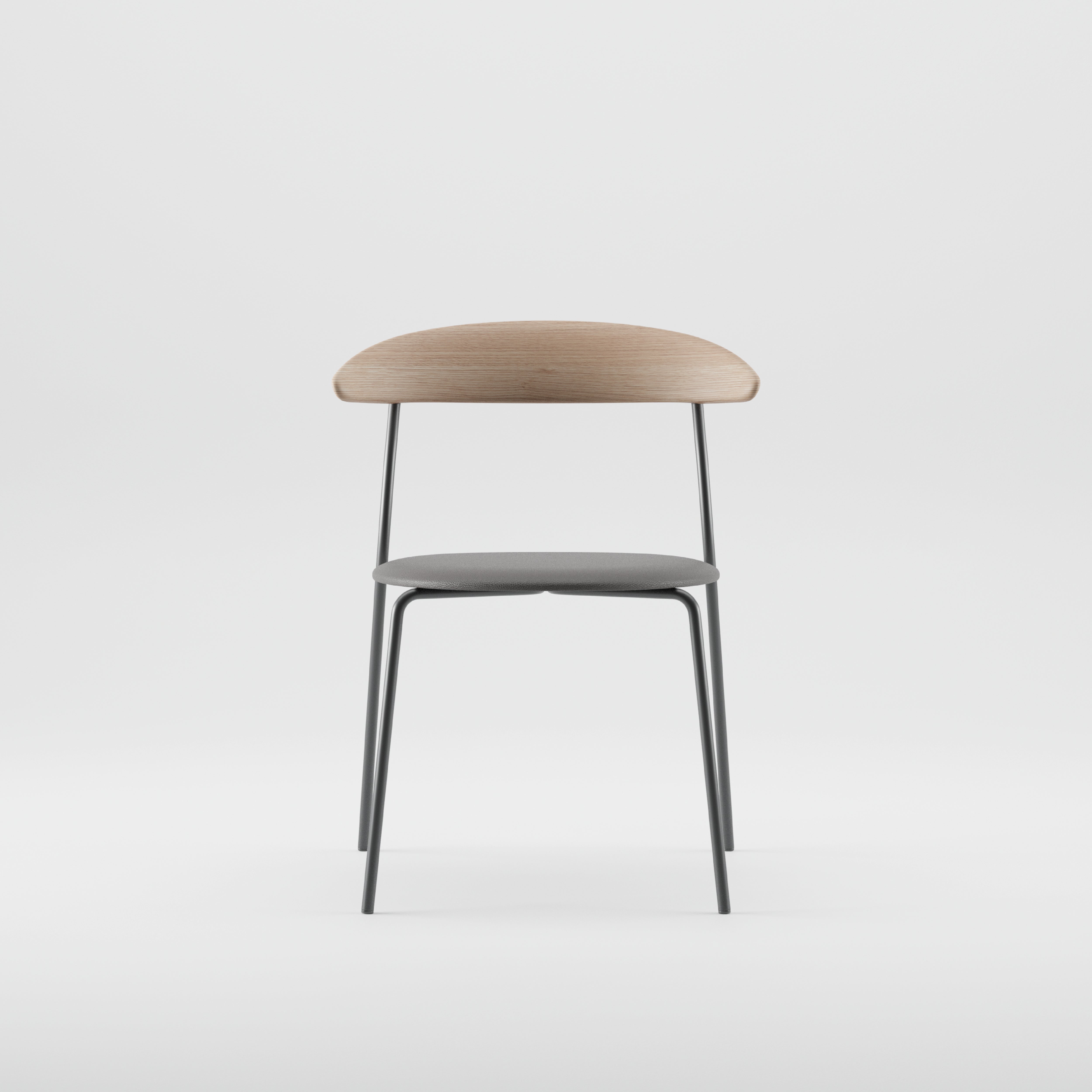 The KINU Chair by Artisan showcases a solid wood backrest treated with natural oils, complemented by black metal legs and a dark gray seat cushion. Crafted from eco-friendly materials, its modern minimalist design stands out against a plain white background.