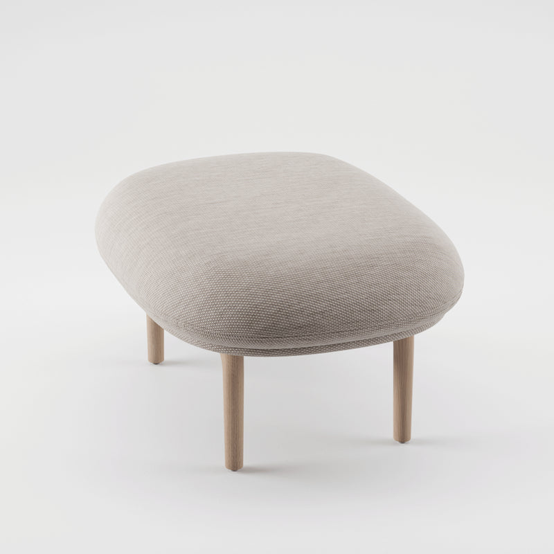 Introducing the Artisan MELA Ottoman: a beige, cushioned stool with an upholstered shell and rounded edges, elegantly set on a sturdy wooden frame against a pristine white background.