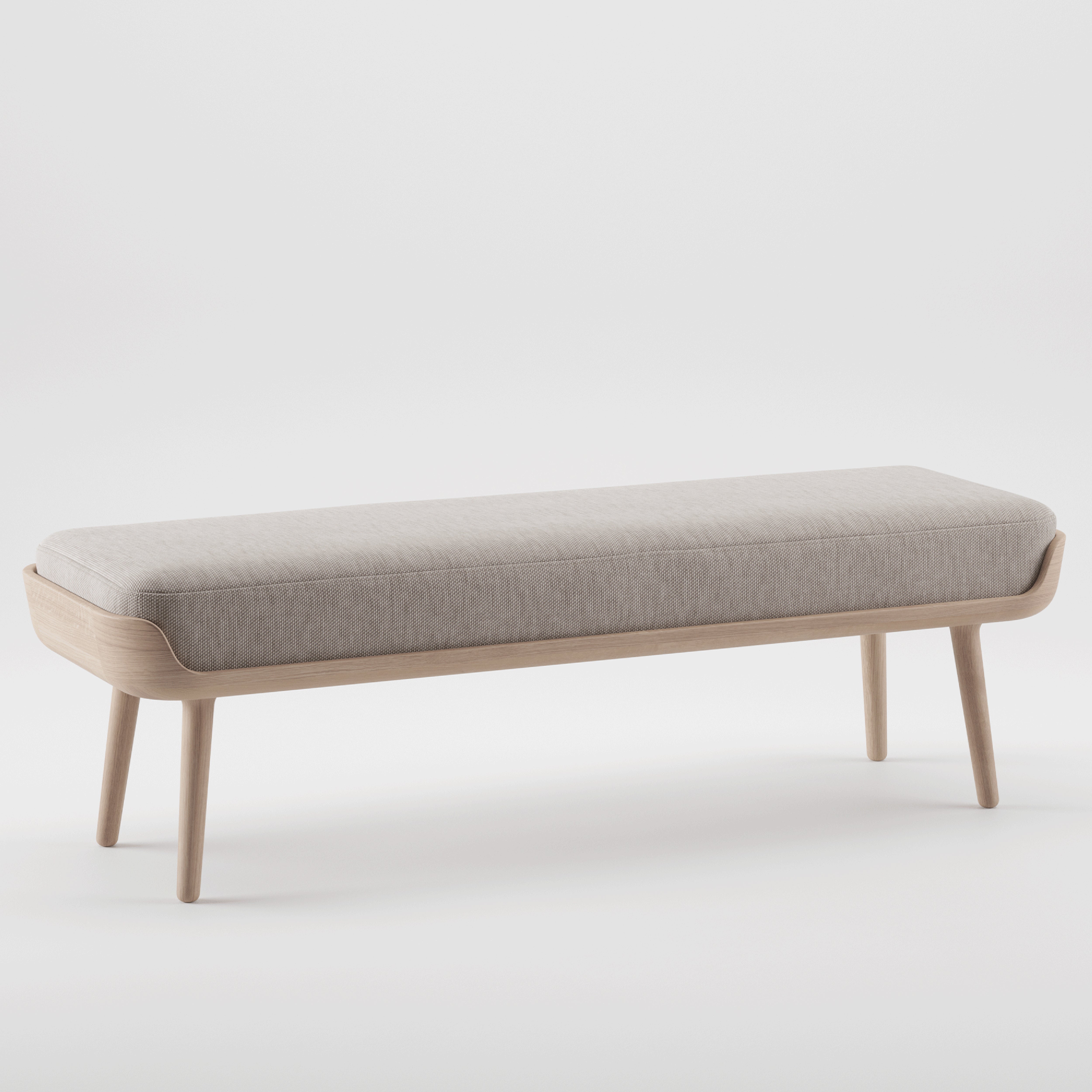 The THOR Bench by Artisan features a modern design with a natural wood frame, four legs, and a light gray cushioned seat. Set against a plain white background, it highlights its minimalist design crafted from eco-friendly materials.