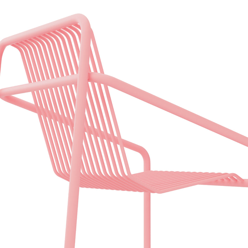 Zoom in on the modern pink metal IVY Outdoor Dining Chair by Objekte unserer Tage. Its sleek, slatted design is weather-resistant, with lines accentuated against a white background that highlight its contemporary style.