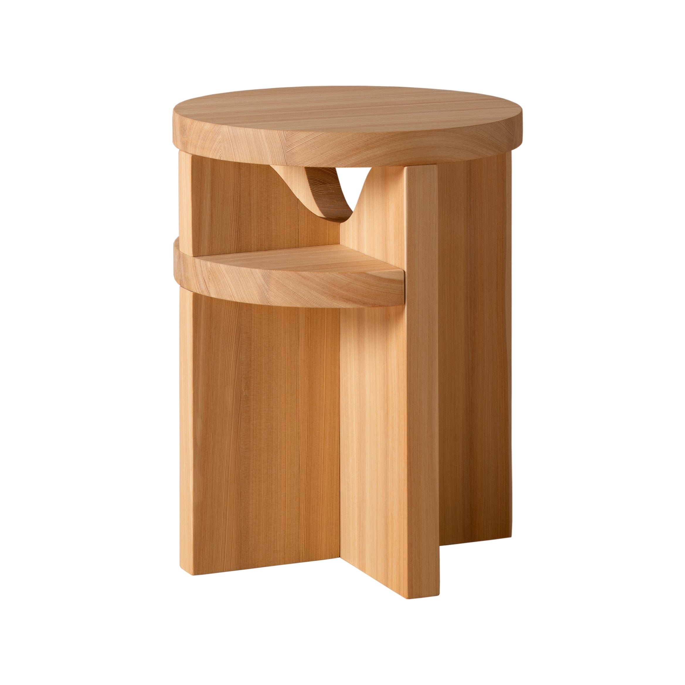 The Tami Stool by Schneid, made from naturally oiled larch wood, features a round top with a unique geometric panel design. Its light wood and smooth finish create a modern, minimalist aesthetic suitable for any space.