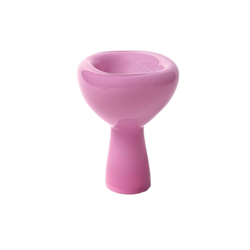 The PHANTOM Dish by Ursula Futura is a pink chair with a rounded bowl-like seat and tapered cylindrical base, featuring a modern design against a plain white background.