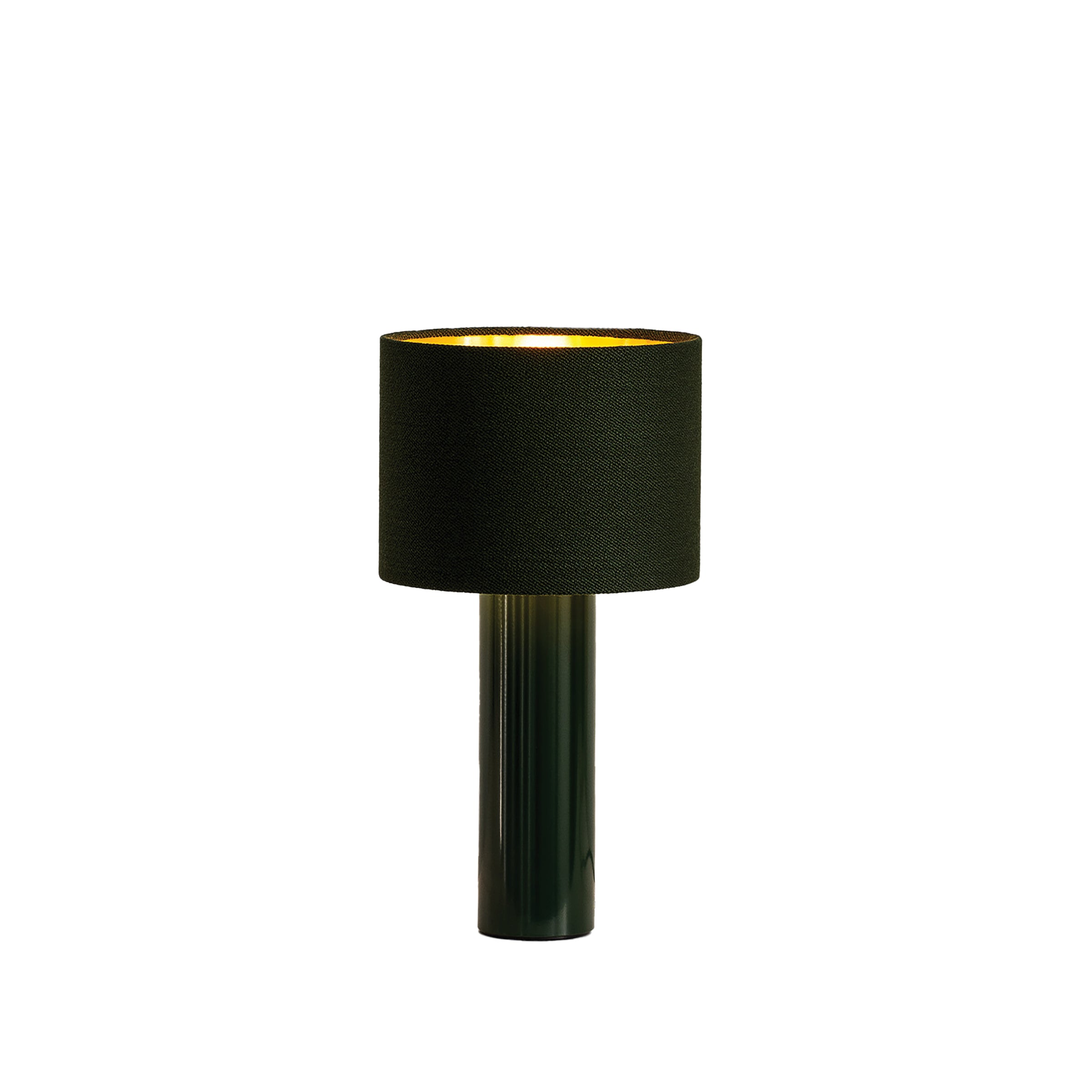 The ALL ROUND MINI Table Lamp by Victor Foxtrot boasts a black cylindrical base with a wool fabric drum shade, casting a warm glow. Its modern design complements any decor, set against a pure white background.