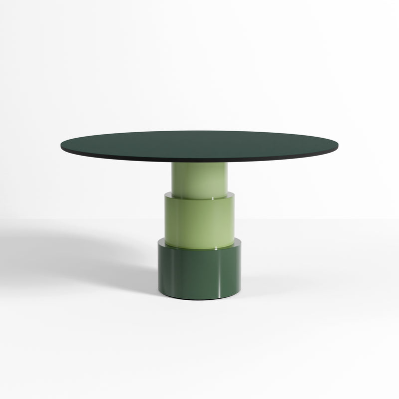 U Turn Table Linoleum with ocean blue round top and three-tone green stacked cylindrical base on white background.