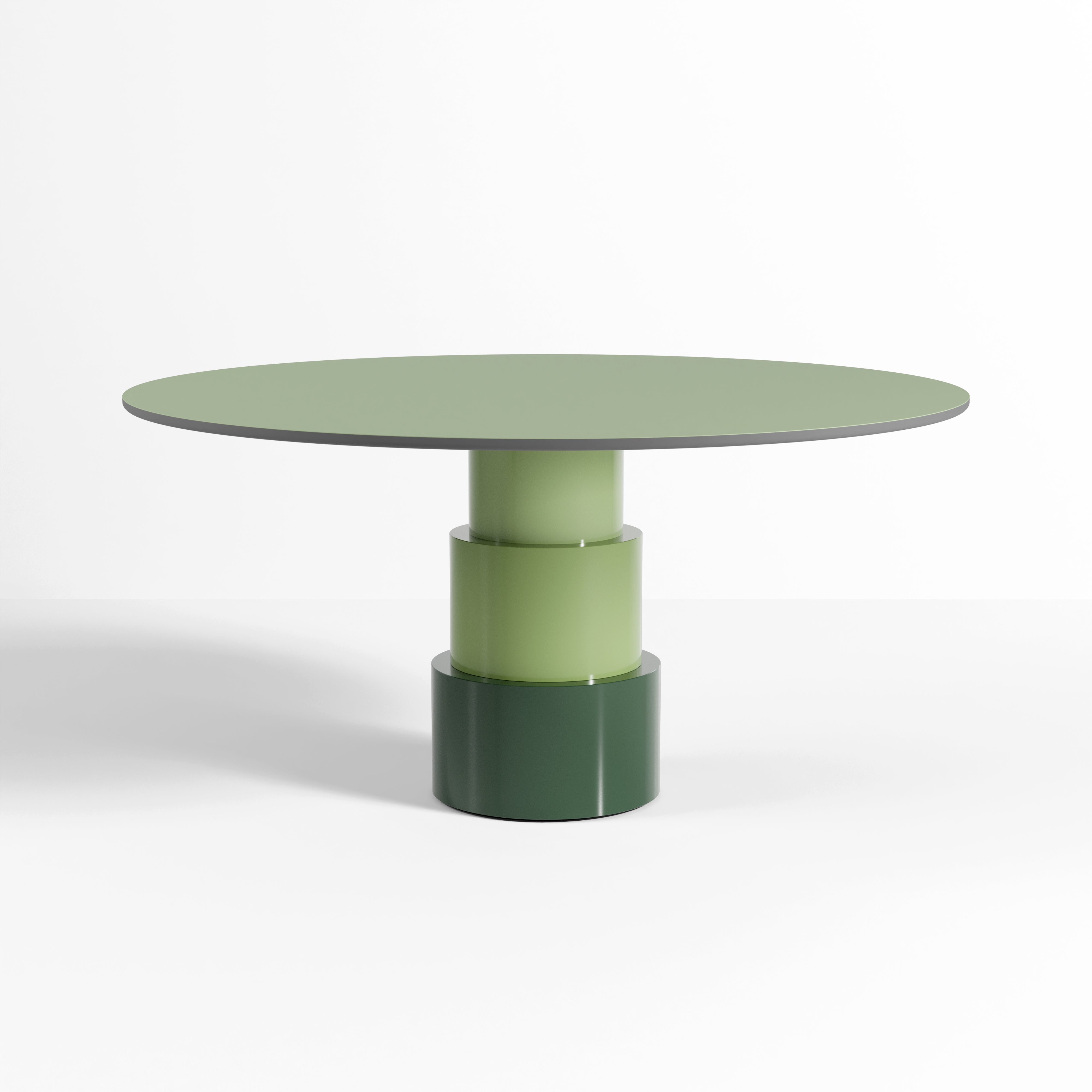 U Turn Table Linoleum with ocean blue linoleum top and green modular tapered cylinder base, sleek modern design.