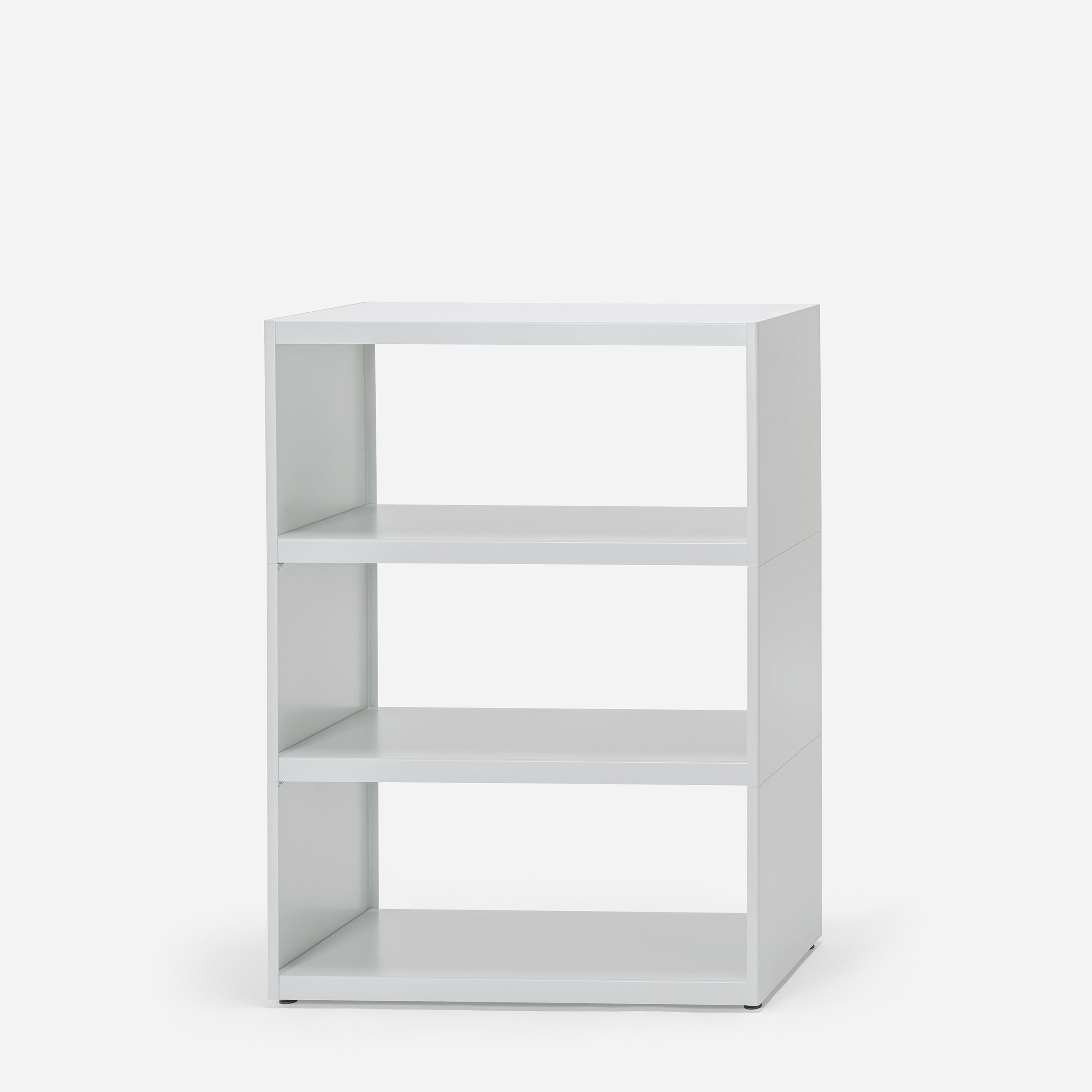 The W1 Stack Shelves by Loehr are a minimalist shelving unit featuring three open shelves, showcasing an industrial design aesthetic against a plain white background.