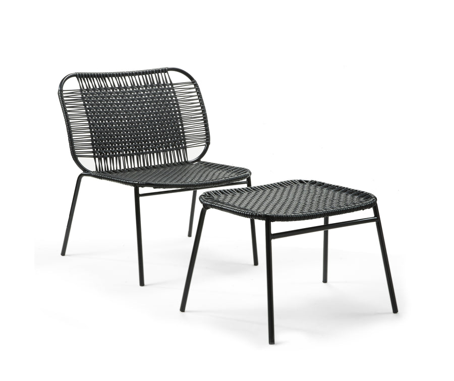Ames Cielo Ottoman by Ames: a black woven chair with metal legs and a matching ottoman, inspired by traditional weaving techniques, stands elegantly against a plain white background.
