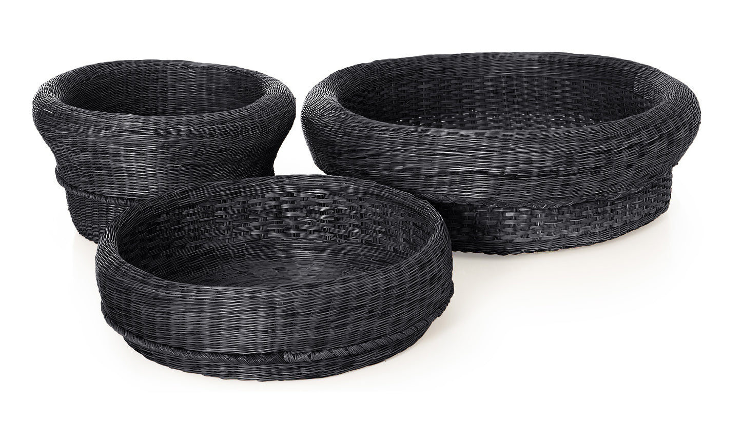 The Ames Fibra Basket Large by Ames is a handcrafted, round black basket made in Colombia from esparto grass. It features a textured, interlaced design and is perfect as part of a stylish set displayed on a white background.