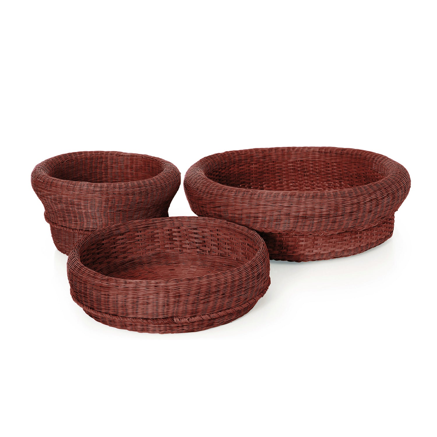 The Ames Fibra Basket Large by Ames, handcrafted in Colombia from esparto grass, features a rich brown woven texture and open top. Shown here with two smaller baskets on a white background, the largest is positioned at the back.