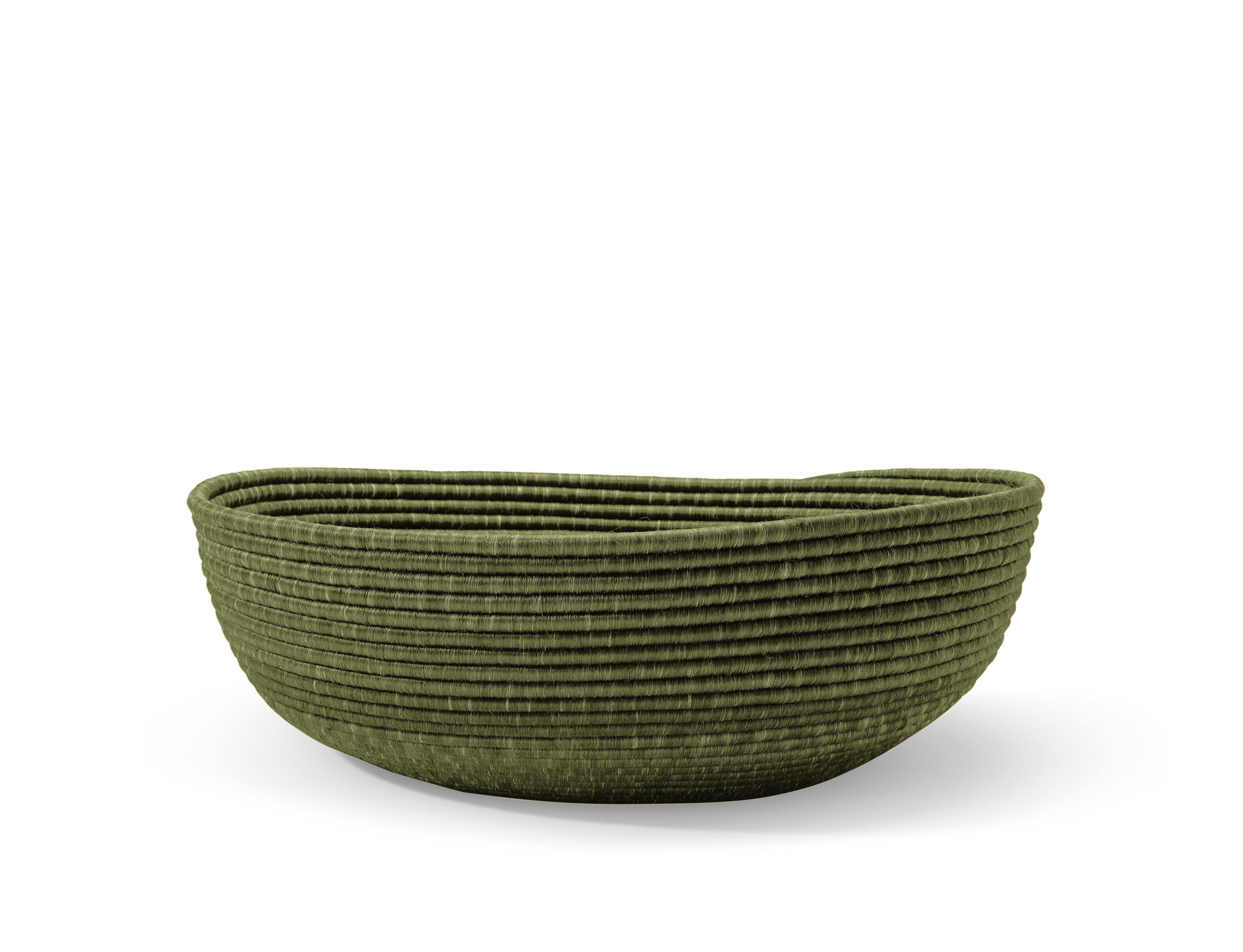 The Ames La Che Basket by Ames is a green, oval-shaped handmade basket with horizontal ridges, crafted from Fique fibers and displayed on a white background.