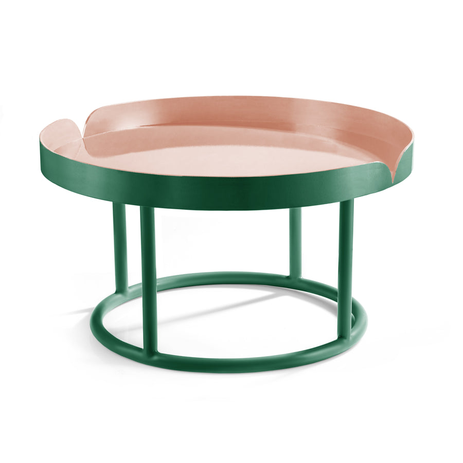 The Ames Victorias Coffee Table 1 by Ames features a modern Amazonia-inspired design with a pink tray-style top, raised edges, and a green circular metal base connected by four vertical legs.