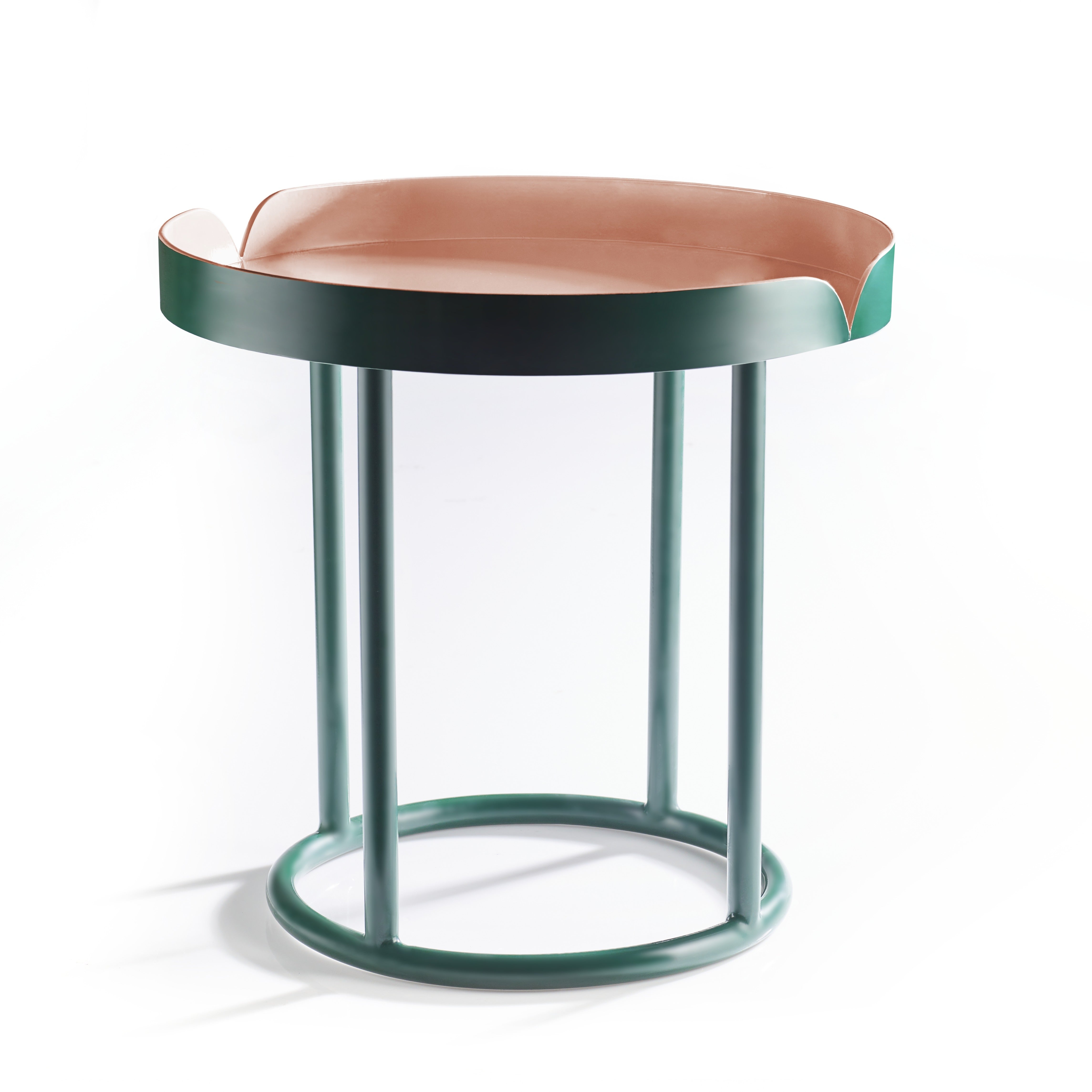 The Ames Victorias Coffee Table 3 by Ames features a green metal frame, four vertical legs with circular supports, and a pink tray-like top with a raised edge and an open section for modern style.