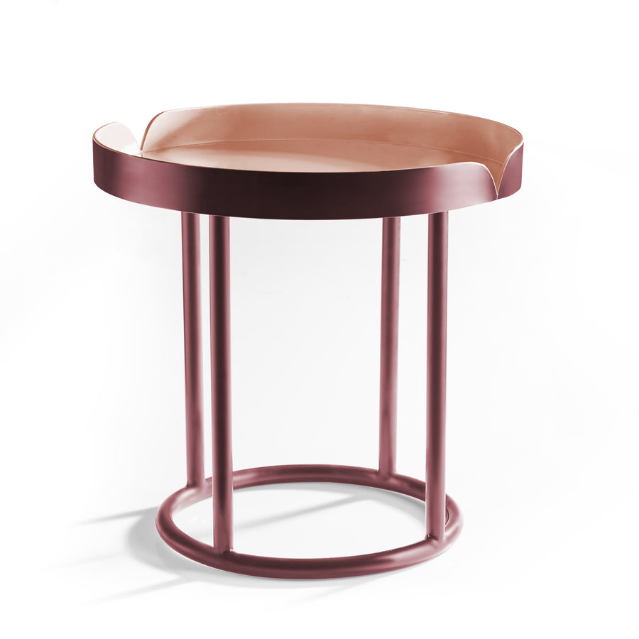 The Ames Victorias Coffee Table 3, by Ames, features a modern round design with a raised tray edge and four tubular legs in a rose gold finish. Part of the Amazonia line inspired by designer Cristina Celestino.