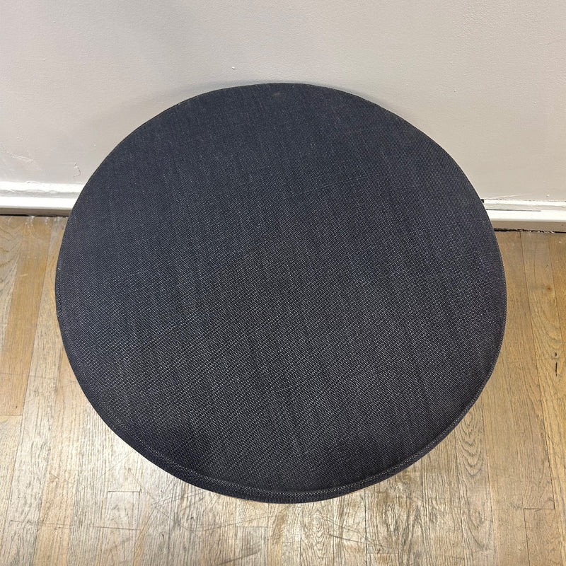 EC02 BESSY Stool with round upholstered seat in Sierra Graphite fabric on oak-veneered plywood base.
