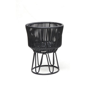 The Ames Circo Flower Pot 1 by Ames features a handcrafted powder-coated steel frame and an open, basket-like synthetic weave in black, creating a stylish modern piece for outdoor spaces. Pictured on a plain white background.