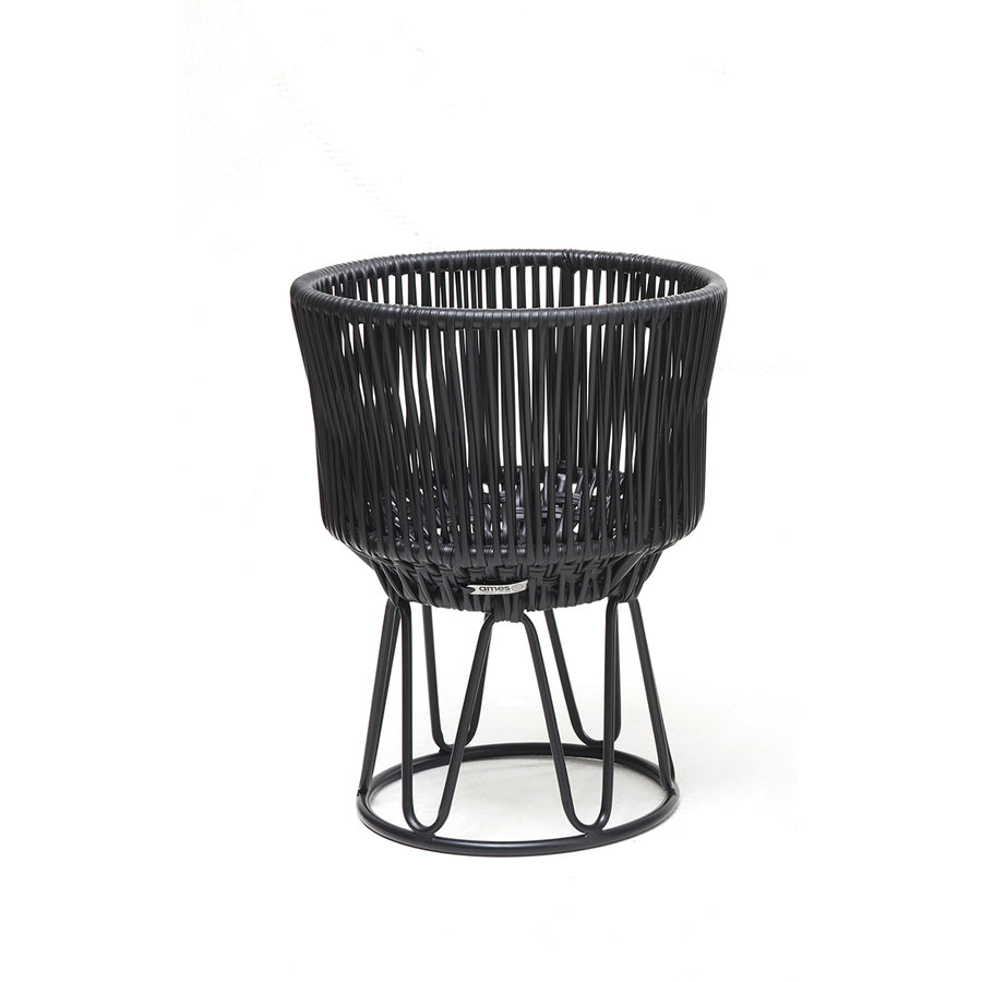 The Ames Circo Flower Pot 1 by Ames features a handcrafted powder-coated steel frame and an open, basket-like synthetic weave in black, creating a stylish modern piece for outdoor spaces. Pictured on a plain white background.
