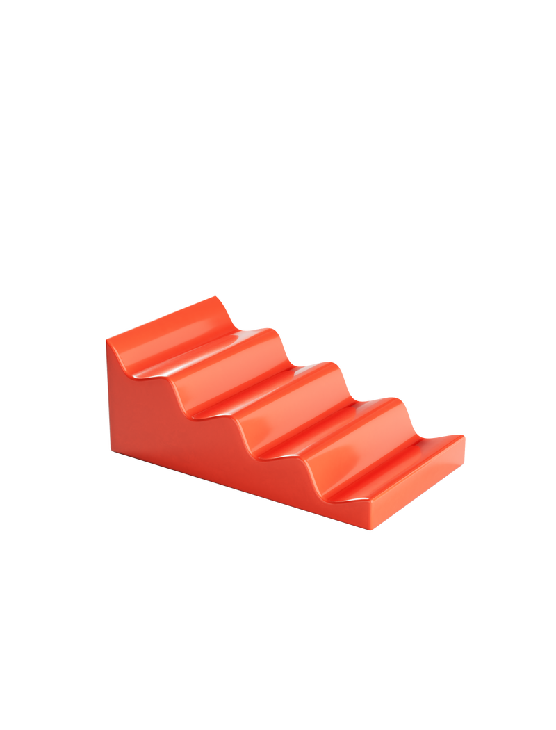 CASCADE Fruitstand in glossy red ceramic with stepped design to display fruits and veggies without bruising.