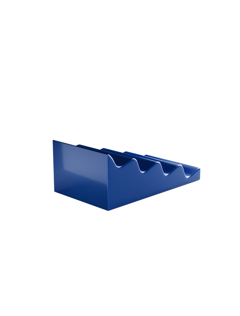 CASCADE Fruitstand in glossy dark blue ceramic with wave design for organizing fruits and vegetables.